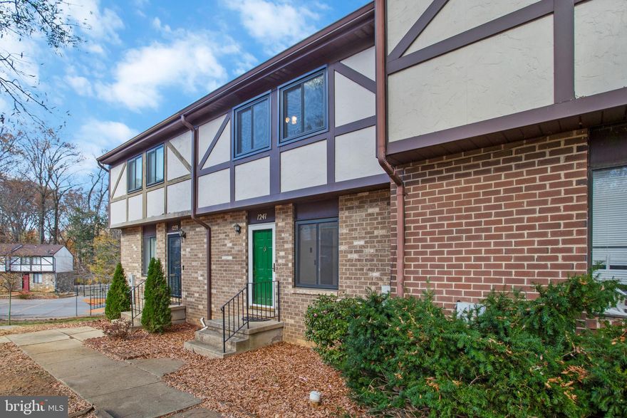 This move-in ready, three-level townhome in Kimberly Woods Village has been stylishly updated and ready for you to make it your own!  This unit offers a unique balance of extra privacy and space, thanks to open areas both in front and behind the backyard.  Stepping inside, you’ll find every detail has been thoughtfully attended to. The kitchen boasts refaced kitchen cabinets and stainless appliances, along with an abundance of natural light streaming through a large window.  This main level includes a convenient half bath, updated with new lighting and thoughtfully situated for both residents and guests.  Brand-new carpet flows into the spacious dining area and step-down living room. An abundance of large windows fill the space with natural light while offering picturesque views of the outdoor landscape.  New carpeting continues up the stairwell, and extends through the hallway and into the well appointed 3 bedrooms.  The owner’s suite boasts en-suite remodeled bath and walk-in closet with built-in shelves.  The hall bath has also been remodeled, and all bedrooms feature ceiling fans with lights.  Both bathrooms have new exhaust fans. The lower-level walkout offers flexibility with its expansive open space, perfect for a family room, home office, gym, or guest suite. Newer sliding glass doors lead directly to an outdoor patio and sodded, fenced backyard.  Home has been freshly painted throughout and updates include new front door, storm door and casement windows in 2022, roof and gutters 2020, newer ceiling fans throughout, washer and dryer replaced in 2023, Trane HVAC in 2015, hot water heater in 2019, and all plumbing pipes replaced with PEX pipes, the newest cross-linked polyethylene pipe.  Easy access to College Pkwy., Rts. 50 and Rt. 2, and in close proximity to Anne Arundel Community College, along with access to the Broadneck Peninsula Trail, nearing completion!