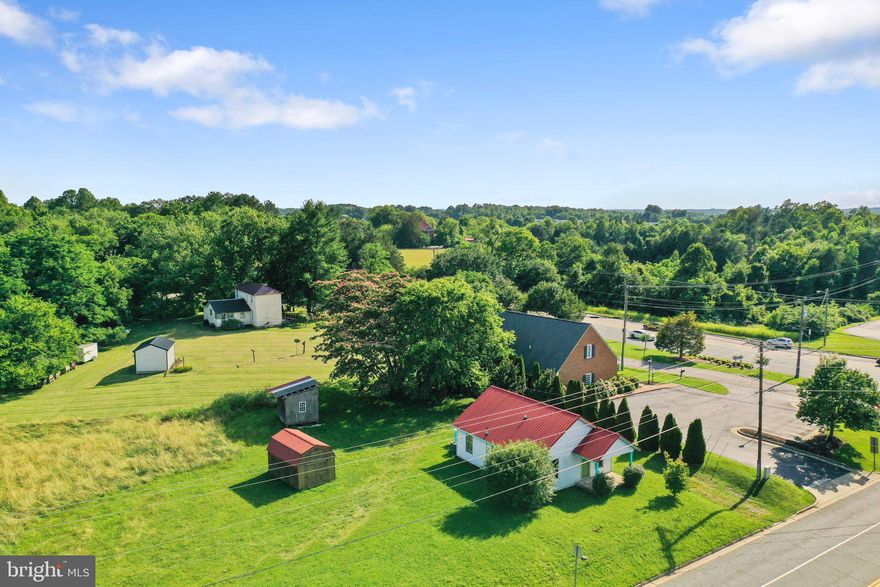 This 3-bedroom, 1-bath home offers a rare chance to secure a large lot in Farmville’s commercial district, giving buyers and investors plenty of possibilities. This property is ready for updates, providing you with a solid starting point for renovation, repurposing, or redevelopment. There are 2 lots totaling over an acre of land in a heavy commercial area on the corner of Main street and Milnwood Rd. with both residential and commercial potential.
Inside, the home feels bright thanks to large windows that bring in natural light throughout the living spaces. The floor plan includes a roomy kitchen, an oversized living area, and 3 bedrooms for future redesign or expansion. The property’s generous lot has a usable outdoor space, detached sheds, and wide open areas surrounding the home.
Situated just off Graham Road and Milnwood Road, this property sits minutes from area staples and the Longwood Village Shopping Center. Local dining options are just up the road. The location also offers quick access to downtown Farmville, schools, and community amenities in every direction.
This property has a strong potential for buyers looking for a renovation project, a rental investment, or a commercial opportunity in a growing area of Farmville. Explore the possibilities and schedule your visit today.