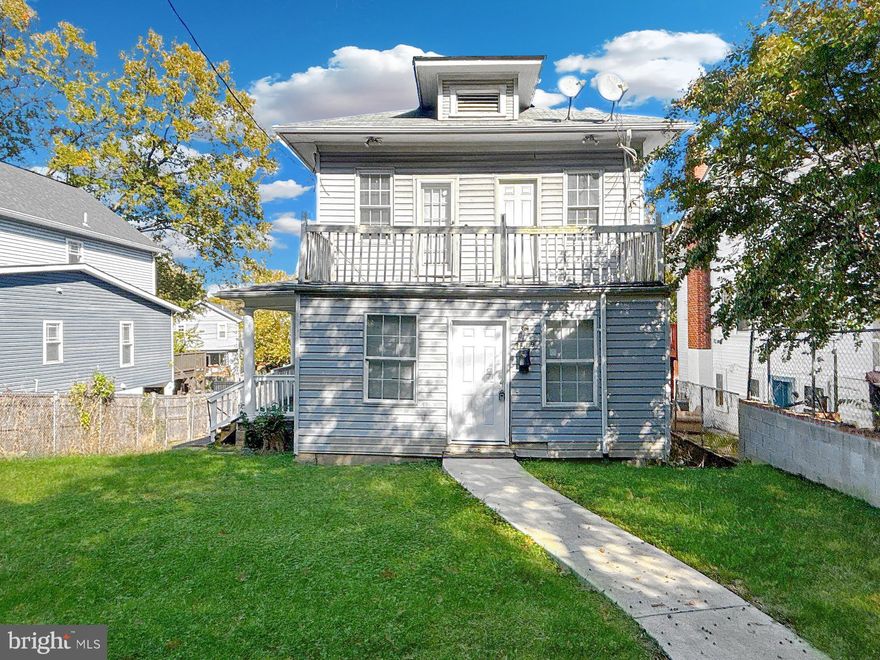 Spacious and versatile four-level colonial located just steps from the D.C. line in vibrant Mount Rainier. This property features 8 bedrooms and 3 full bathrooms across approximately 1,876 finished square feet of living space, offering exceptional flexibility for multi-generational living, rental income potential, or large households. The main and upper levels showcase beautiful original hardwood floors, bright natural light, and generously sized bedrooms. A fully finished basement includes a kitchenette, full bath, and multiple rooms—ideal for an in-law suite or separate living quarters. The home is equipped with central heating and cooling throughout all levels for year-round comfort.

Outdoor amenities include a front-facing roof deck, two side decks accessible from upper-level bedrooms, and a large, level backyard on a 6,452 square foot lot with a private two-car driveway in the rear. Some cosmetic repairs are needed, and the property is being sold strictly as-is, presenting a valuable opportunity for buyers to customize or invest. Located close to parks, dining, public transportation, and major commuter routes.