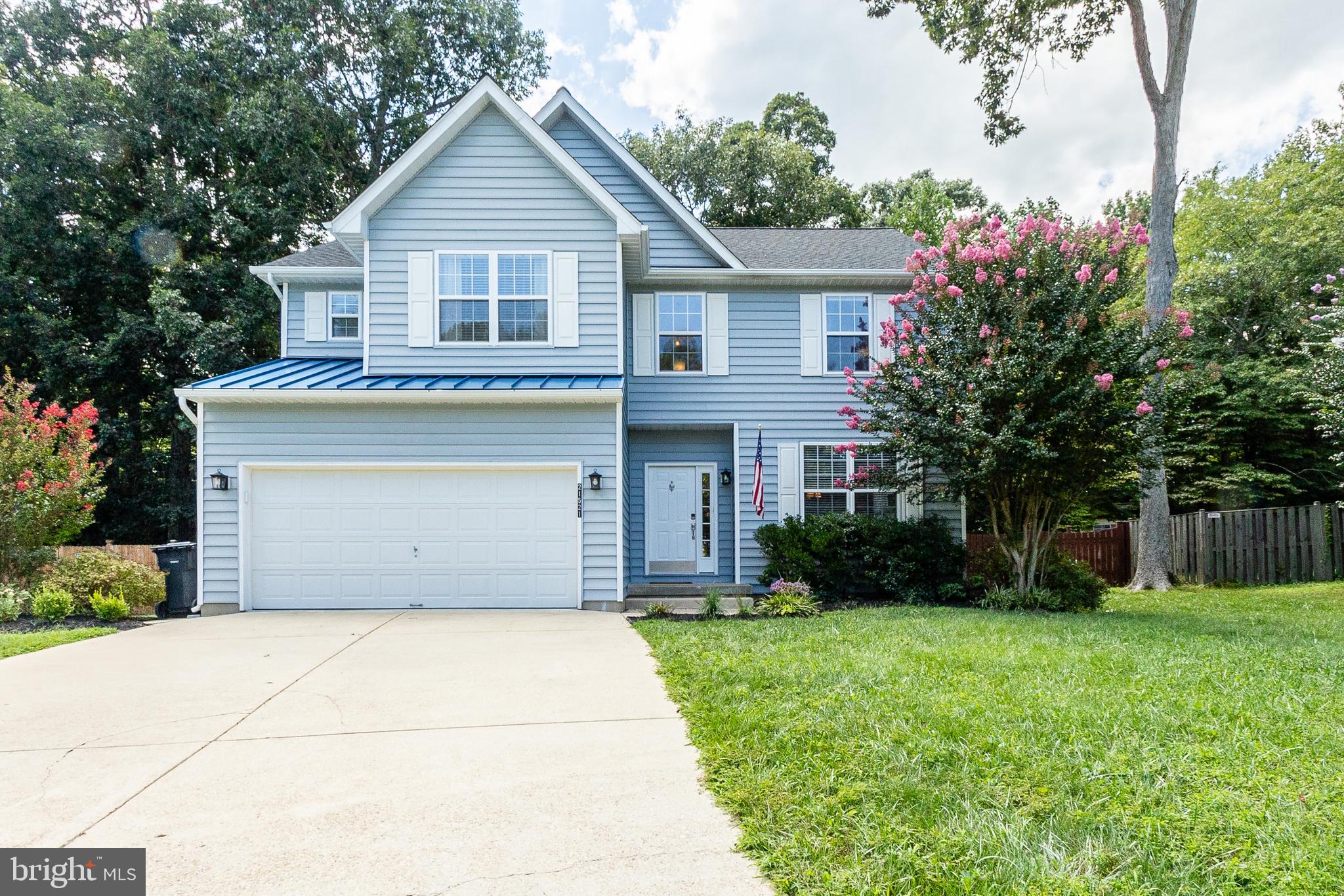 Step into this inviting two-story colonial home in the sought after Swash Bay community. The main level boasts warm upscale laminate floors throughout with a functional and inviting floorplan. The heart of the home is the open family room with its two-story height and expansive windows that flood the space with natural light, offering beautiful views of the outdoors.
The kitchen has been thoughtfully updated, featuring granite countertops, stainless steel appliances, and a stylish backsplash. Upstairs, you'll find four spacious bedrooms, including a primary bedroom complete with an custom designed walk in closet and a beautifully renovated connected bath. The bathroom boasts a ceramic-tiled shower, dual sinks, upscale flooring, and an attractive free standing tub giving a spa like experience.
Outside, you will love the cool breezes and entertaining on the large covered porch complete with wired speakers for music enjoyment. Overlooking the level fenced yard with a custom stone patio and firepit, all bordered by mature trees provides for added privacy. The community sandy beach with water access is just a short walk away, and there are convenient walking and jogging trails nearby for outdoor enthusiasts. Come & see before this one is gone....