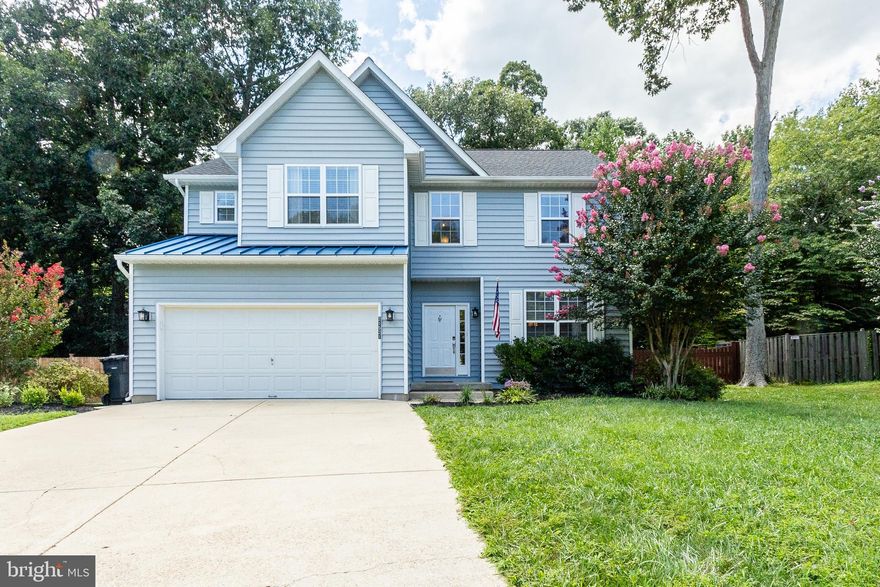 Step into this inviting two-story colonial home in the sought after Swash Bay community.  The main level boasts warm upscale laminate floors throughout with a functional and inviting floorplan. The heart of the home is the open family room with its two-story height and expansive windows that flood the space with natural light, offering beautiful views of the outdoors. 

The kitchen has been thoughtfully updated, featuring granite countertops, stainless steel appliances, and a stylish backsplash. Upstairs, you'll find four spacious bedrooms, including a primary bedroom complete with an custom designed walk in closet and  a beautifully renovated connected bath. The bathroom boasts a ceramic-tiled shower, dual sinks, upscale flooring,  and an attractive free standing tub  giving  a  spa like experience.

Outside, you will love the cool breezes and entertaining  on  the large covered porch complete  with wired speakers for music enjoyment. Overlooking the level fenced yard with a custom stone patio and firepit, all bordered by mature trees provides for added privacy.    The community  sandy beach with water access is just a short walk away, and there are convenient walking and jogging trails nearby for outdoor enthusiasts.  Come & see before this one is gone....