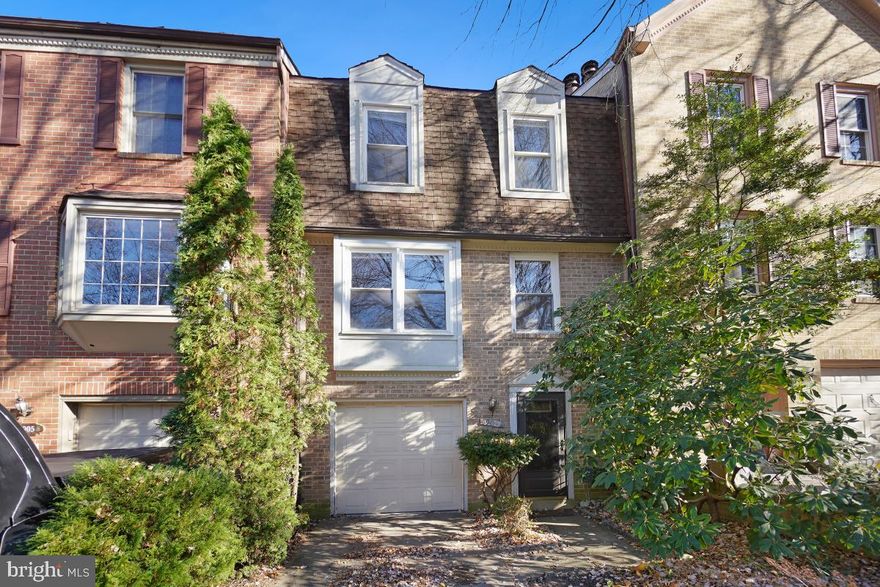 Welcome to 907 Wild Forest Dr! This stunning brick front townhome features over 2,200 square feet of living space on 3 finished levels. Enjoy 3 bedrooms and 2.5 bathrooms with an attached garage. Lower level entry with garage access and large rec room. There are tons of closets off the rec room offering tons of storage. The main level boast wood flooring throughout with a bright living room including a wet bar and cozy fireplace. The eat-in kitchen offers stainless steel appliances, granite countertops, and beautiful custom cabinetry with ornate details. The kitchen overlooks the formal dining room with ample room for a large table. Off the dining is access to the private back deck backing to the mature tree line. There is also a laundry space and half bath on this level. The upper bedroom level includes a primary suite with vaulted ceiling and a huge double closet. The ensuite bath includes a walk-in glass and tile shower and separate vanity area. The secondary bedrooms are both well-appointed and share a full bath. Easy access to major commuter routes and public transit options. Just minutes to shops, restaurants, local parks and schools. Schedule your showing today!