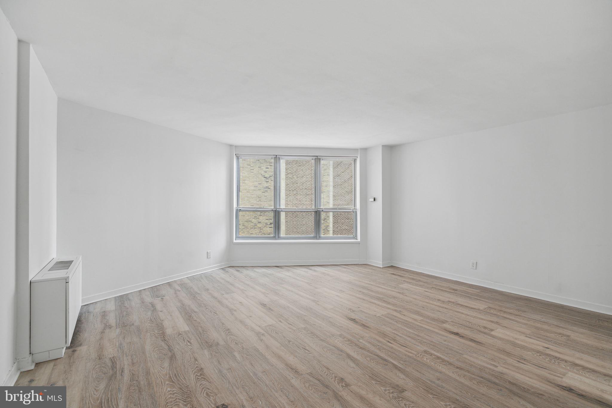 Photos are of a different unit with similar finishes. Sun-drenched studio on a high floor of The Dorchester on Rittenhouse Square. This beautifully appointed home features wood floors throughout; a generously sized living area with oversized windows; an updated kitchen with dark wood cabinetry, quartz countertops, and stainless steel appliances; excellent closet space; and a full hall bathroom with a single vanity, shower/tub and nice tilework. Residents of The Dorchester enjoy a twenty-four-hour doorman and all utilities included in rent except cable TV/internet. Use of the building's state-of-the-art fitness center, seasonal rooftop pool club, and valet parking in the building's underground garage are available for an additional fee, subject to availability. No pets permitted. Rittenhouse Square is ranked the 6th best neighborhood in North America with 175 restaurants and 199 retailers within a three block radius. The Dorchester is within walking distance to the Market Street office corridor, The Avenue of the Arts and University City. 30th Street Station and Philadelphia International Airport are a short commute.