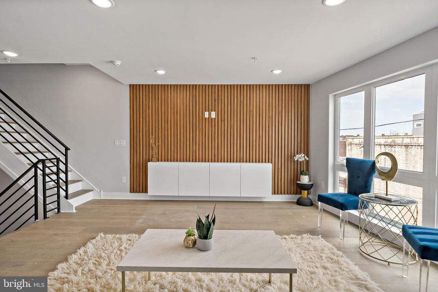 Welcome to Moyamensing Square , an exciting new construction planned community with 24 chic residences  in the heart of Pennsport !  These units are bi-level with an open floor plan. This Penthouse   unit that gets lots of natural sunlight and  has roof top deck with 360 views city and Bridges.  Features include wide-plank hardwood floors, custom Kitchen cabinets, quartz countertops, and recess lighting, and great city views from each floor.  Main floor has living, room , dinning room, and kitchen. Upper floor has Primany bedroom with ensuite bathroom . Across the hall is two more bedrooms and bathroom. This unit has 1 CAR GARAGE ! Builder is offering one year home warranty and  tax abatement. This a very walkabout neighbor hood that has Dickinson Square park just one block away and Hermanns coffee. There are plenty of restaurants and shopping near by including Target and Ikea . There is still time to pick finishes . Take a look at the attached brochure .  Pennsport is  one of the most storied Philadelphia neighborhoods around with  its vibrant dining, boutiques, and shops are the best of the modern world.  New Construction. Square footage total includes above grade space and below grade space and is estimated. Taxes and square footage to be verified by the buyer. Renderings are for marketing purposes only.  This Unit has upgraded  floors and upgrade Kitchen and  custom tile.