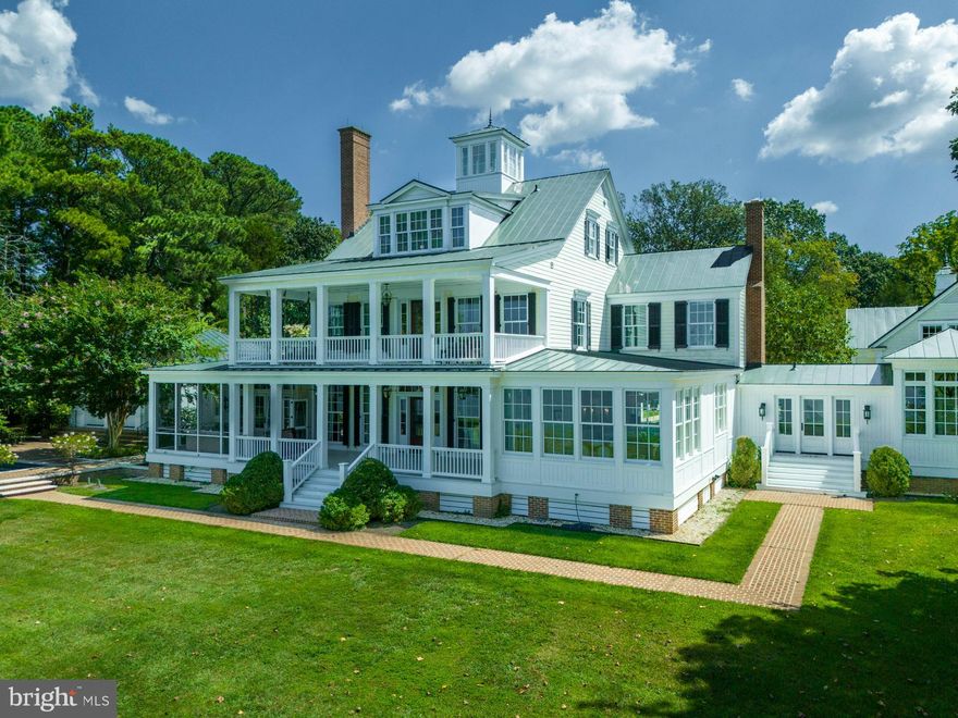 Magnificent Southern Colonial Estate on the Tred Avon River. This architect-designed home (completed in 2012) was meticulously built by local custom home builder with great attention to detail inside and out. House boasts soaring ceilings, reclaimed Heart Pine Flooring throughout, huge windows, large gathering spaces including a great room and family room with fireplaces, Library with fireplace and extensive reclaimed wood paneling, downstairs office/study, a Conservatory, kitchen with high-end everything overlooking Breakfast nook with 3 sides of windows. Second floor includes Primary Suite with Morning Room/Coffee Bar, His & Hers Bathroom, large closet and a separate Bedroom suite with private bath. The third floor includes a Nautical-Themed recreation room, 2 bedrooms and 2 full bathrooms. There is a private suite over the garage with dedicated staircase, kitchenette, living space and bedroom, full bathroom. The home includes too many amenities to mention but here are some examples; Screened porch, Waterside porch, Balcony on 2nd floor, Hand-rolled standing seam roof, Elevator, extensive mill-working/cabinetry, gas lanterns/fixtures, two islands in the kitchen, brick floors in the mudroom, built-in lockers, attached 2-car garage with custom Carriage House doors. Property is improved with an in-ground pool, a reflecting pool, brick hardscaping, patios, extensive landscaping/parking courtyard, pool houses, a detached Spa, a separate 2,000+/- sq ft guest house with full kitchen, private parking area. Property is located in Waverly, minutes from historic downtown Easton, with high elevation and western exposure, deep water dockage, 6’+/-  MLW, 4.5+/- acres. Incredible offering.