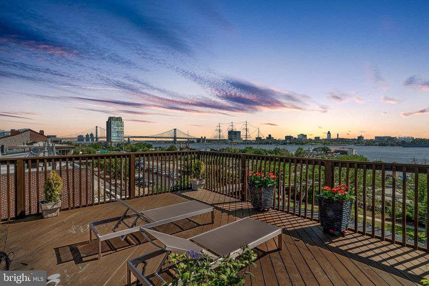 Luxury living with 360 degree Center City skyline and Delaware River views. Drive into your oversized attached garage, go down a few steps and soak in the heated salt water pool with desert heat controls. Enjoy a steam shower and cocktail on the patio then use the elevator to go to one of two master suites, relaxing with spectacular Delaware River views. Architecturally divine, with open light-filled living space, flexible bedroom suites - perfect for au pair or in-law. Or simply enjoy two expansive master bedroom suites with room for home office, yoga room and guest room. Rooftop IPE deck with built-in BBQ and counter space is perfect for entertaining - just the two of you, or a party of 50. Open eat-in gourmet kitchen features stainless steel appliances, Viking stove, wine cooler and wine storage. Two fireplaces. Expansive 360 degree views of Philadelphia and Delaware River from living area as well as both master suites. Pamper yourself with yoga room and work from your home office. First floor open floor plan features front living room with gas fireplace and stunning views, flowing into gourmet kitchen and family dining / entertaining area with 90  inline electric fireplace. Second story has two separate bedroom suites, one with bonus room perfect for in-law apartment, wellness center or expansive home office. Third floor master suite with stunning Delaware River views features expansive walk through master bath and master closet with connecting extra bedroom. Ideal location perfect for enjoying the best restaurants in Philly located in Queen Village, Society Hill and Old City, entertainment at Penns Landing, waterfront walks and bike rides, or visit the Cherry St Pier for some artistic inspiration. Easy remote lighting control set up on Caseta by Olutron Smart System. Recent updates include new Pella windows. Located in William Meredith Catchment   one of the best Elementary schools in Philadelphia. Easy access to 95 or 76 and Amtrak. Less than 10 miles to Philadelphia International Airport. Perfect location for easy commute.