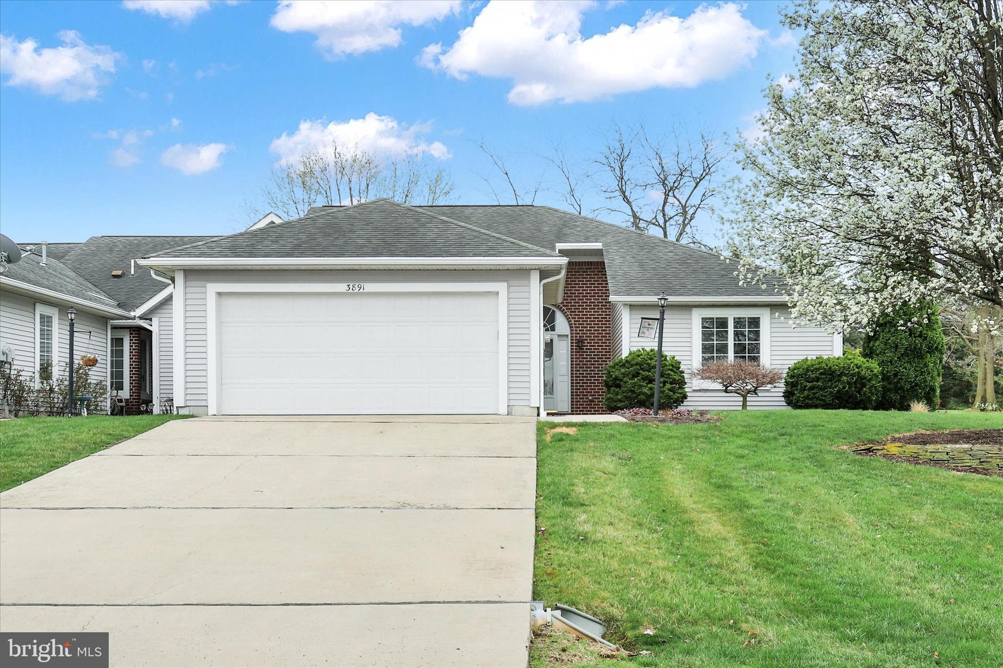 Convenient one-level living in Penn National Community! HOA covers lawn care and snow removal. Home has two beds and two baths. Wood floors in living and dining areas. Fresh paint throughout. Sliding door leads to rear patio. Primary suite has walk-in closet. Double closets in second bedroom. Take a tour today! The walkable community offers extensive amenities, including 36 holes of 4-star golf, an outdoor pool, tennis/pickleball courts, yoga classes, a community garden, more than 40 social clubs, and a restaurant + bar. Protective covenants and restrictions apply. For more details on memberships, visit the pro shop!