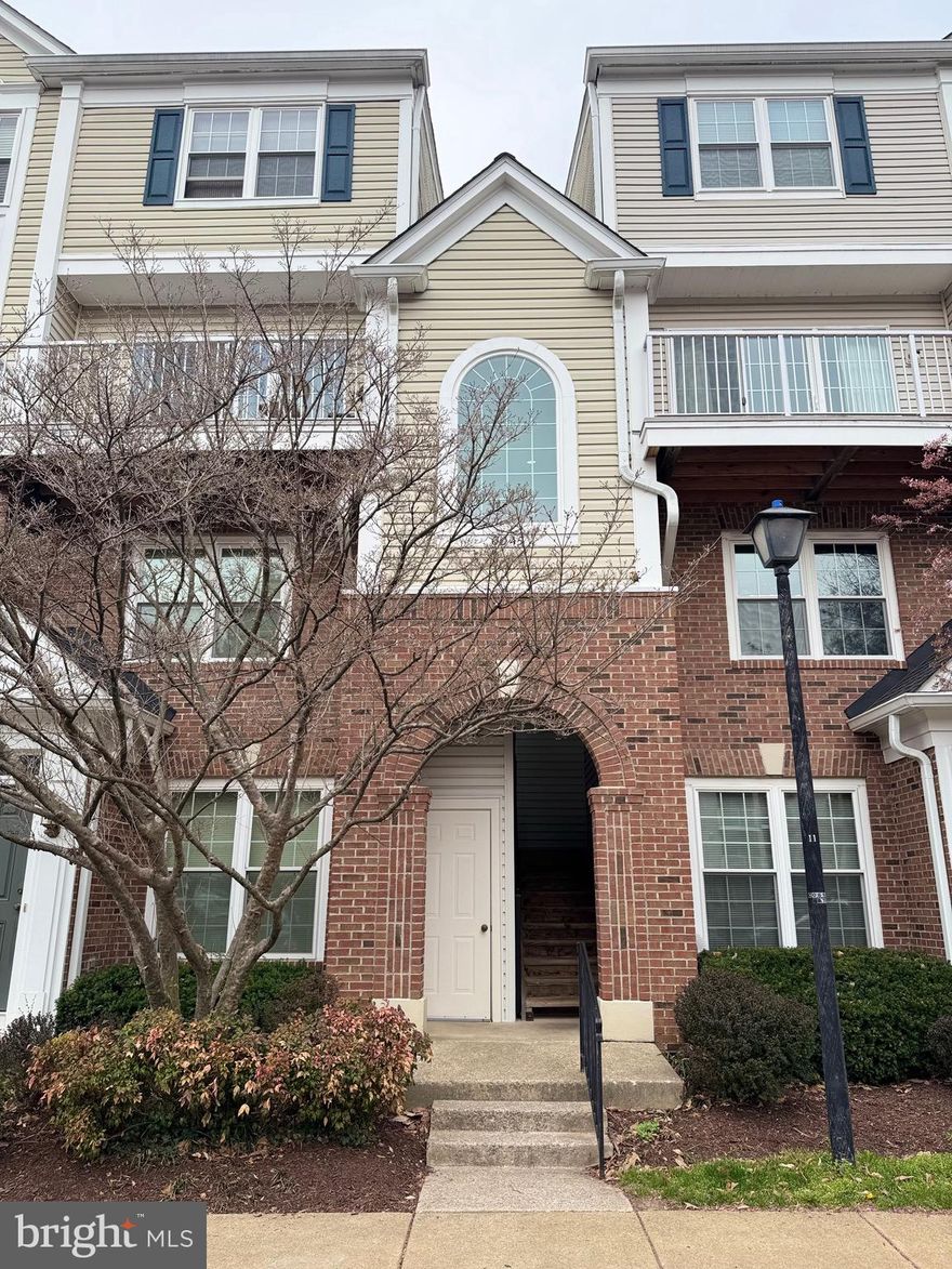 Vacant and ready for immediate occupancy.  Charming two level end unit condo backing to trees with a corner deck.  Neutral paint throughout, two master suites on the upper level both with full baths and walk in closets, Spacious kitchen with granite counter tops, stainless appliances, and space for a table - Large open family room with  fireplace - newer windows for energy efficiency - reserved parking space - fantastic community amenities - club house & outdoor pool.  Multi  year lease available