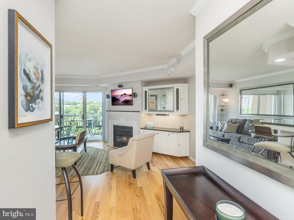 Looking for an alternative extended stay option? This fully furnished, all-inclusive luxury condo located just off I-395 in the heart of Alexandria is fully equipped with everything you need - just bring your suitcase and toiletries! Boasting a 10th floor private sunset-view balcony and gas fireplace, this unit is professionally painted in a light gray neutral color and features an open floor plan, walnut hardwood floors, chef's kitchen with granite countertops and stainless steel appliances, full size washer/dryer, closets with ample organizers to store all your belongings and a large assigned garage parking space. Included in the furnishings are two smart TVs and a desk w/monitor for your laptop. All utilities, premium cable, high-speed internet, monthly cleaning service, move-in related association fees, maintenance and all condo amenities are included in rent. You pay NOTHING other than application fee, initial security deposit and rent! There’s nothing else like it! Located in one of the best maintained communities in the area, Northampton Place Condominium is the perfect location to live, work and play; just minutes from Arlington, Old Town Alexandria and Downtown DC. You'll be able to enjoy the fantastic amenities - first floor fitness center w/saunas, billiard room, resident lounge, party room w/bar/kit/lounge plus outdoor picnic area with gas grills, firepits and heated pool. Metro and DASH bus stops to the Pentagon and Old Town Alexandria are just a few short steps away! Very Walkable: 70 Walk Score. Good Transit: 62 Transit Score. Bikeable: 63 Bike Score. Please note: Listing agent is also owner.
