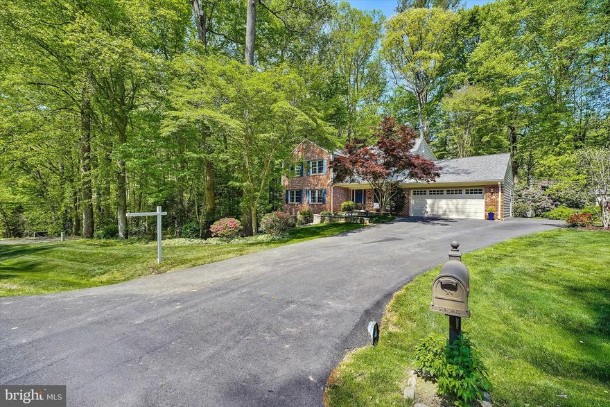 This lovely brick-front colonial is nestled on over one-half an acre in the exclusive and sought after Oakbrook community of Fairfax Station.

The home’s traditional layout offers a seamlessly integrated kitchen/family room combination, complete with a cozy masonry wood burning fireplace creating a spacious space to gather, relax, and entertain. Other rooms on the main level include a large dining room, living room, library equipped with a wine cooler and bookshelves, and a laundry room. The French doors off the family room lead to a relaxing screened-in porch and separate deck, overlooking your private rear yard and nature’s awesome beauty.

The upper level offers a large master suite, three additional generous sized bedrooms and two full bathrooms. The master suite has a large walk-in closet and a luxurious master bath with a beautiful tile shower and soaking tub, all accented by natural sunlight from the skylight.

The home includes a fully finished walk-out lower level that opens to a brick patio and  private backyard, spacious rec room equipped with a built-in fully functional antique phone booth  (very cool ), full bathroom, large utility room/ workshop and lots of storage area.

The large exquisite .63 acre lot is sure to satisfy all of your family’s needs. The open side yard is perfect for kids and their sport’s activities. The rear yard with mature landscaping, brick walkways, deck, patio and fire pit area is perfect for relaxing and unwinding.

The pride of ownership will be on full display when you tour this meticulously maintained home. The new Carrier HVAC system was installed in 2022. New water heater was also installed in 2022. New roof installed in 2019.
