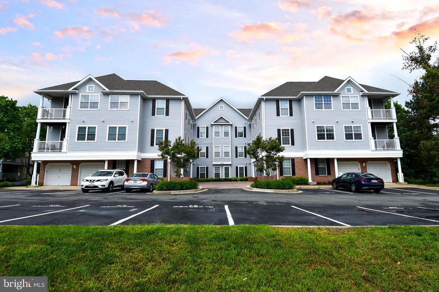 Welcome home to this lovely 2 BR/2BA condominium in the Milestone Condominium Community. This is a Turn-key property, just bring your toothbrush and move right in. This unit has been lovingly maintained with beautiful, gleaming hardwood floors throughout. Both the hall bath and primary bath have been recently updated with beautiful fixtures, white cabinetry, and ceramic tile flooring. Enter the unit from your private garage or your front door into your own private foyer. You have your own private indoor stairs, a rare and welcome feature in these units, leading up into your main living area. Enter your welcoming living room complete with a gas fireplace and beautiful hardwood floors.  Imagine simply relaxing by the fire on a cold winter’s night with the flip of a switch. Off the living area is a well-lit dining area which has a large window to let in tons of natural light that spills into the open concept kitchen.  Relax and have a meal at the breakfast bar or dining room. The modern looking kitchen has beautiful cabinetry, white tile backsplash and quartz counters with newer appliances and built in microwave. There is a separate laundry room, with a full-size washer/dryer. The hall bath has been meticulously updated and modernized with a beautiful tub shower. Down the hall are 2 lovely large bedrooms.  The Primary Bedroom has a wall of closets and its own ensuite updated bath with a large walk-in shower with storage nook.
New HVAC 3 years - Hot water heater 5 years
The scenic community outdoor pool is a short distance from the unit, along with proximity to walking trails and tot-lots. Reserved outdoor parking space as well as an interior garage space. Fantastic shopping close to Wegmans, Target, and Home Depot. Nearby, The Milestone Shopping Center offers plenty of shops and restaurants.  Conveniently located just minutes from Hwy 270, shopping centers, restaurants, Wegman's market, and much, much more.