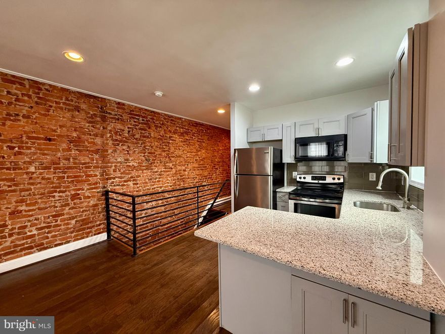 Welcome to 1830 Harrison Street, a beautifully renovated multi-family property located in the heart of Frankford, offering an excellent opportunity for both investors and owner-occupants alike. This turnkey duplex features two thoughtfully updated units with modern finishes and strong rental potential.
Unit 1 is filled with natural light, creating a warm and inviting atmosphere. This unit spans the entire first floor and extends into a fully finished basement, offering a spacious one-bedroom, plus den, and two full bathrooms layout. The lower level provides generous bonus living space along with an additional room perfect for a home office, den, or extra storage. This unit also enjoys private access to a large rear yard, ideal for outdoor entertaining or relaxation. Recently renovated throughout, it features recessed lighting, exposed brick accents, new luxury vinyl plank flooring, updated kitchen cabinetry and countertops, modern bathrooms, and an in-unit washer and dryer setup. 
Unit 2 is a tastefully finished two-bedroom, one-bathroom apartment, also recently renovated with the same cohesive finishes. Highlights include recessed lighting, exposed brick, new LVP flooring, updated kitchen and bath, and in-unit washer and dryer. Natural light pours in throughout the unit from windows on three sides, enhancing the clean, modern design.
With separate entrances, updated systems and finishes, and strong layout versatility, this property is well-suited for generating rental income or living in one unit while renting the other. Conveniently located near local shops, dining, public transportation, and easy access to I-95, 1830 Harrison Street offers both comfort and accessibility in a growing Philadelphia neighborhood. Schedule your showing today!