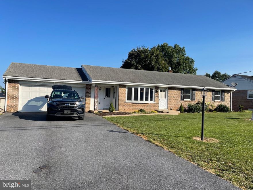 Remodeled Rancher w/hardwood floors, new vinyl plank and new carpet. New granite, new vanities, new gas furnace and new A/C. Large layout, walkout finished lower level, 23 x 6 sunroom, large 2 car garage, great flat yard w/room to expand patio or deck.