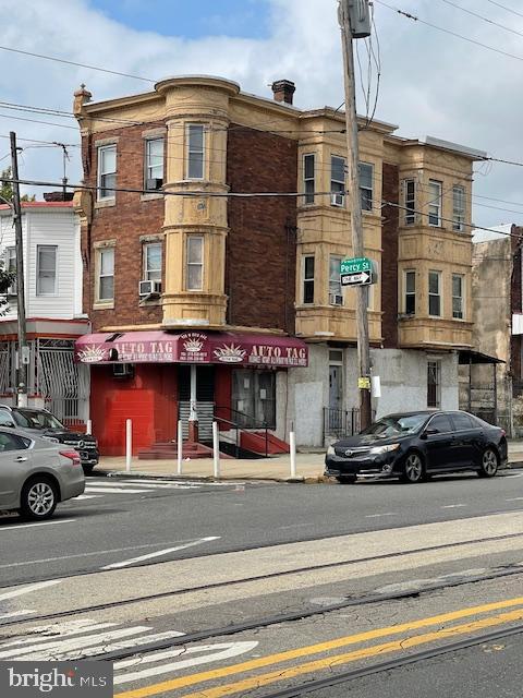 Huge corner building in the Franklinville section of Philadelphia! This property has great potential and may be your cash cow. Legal commercial with two dwellings! The first floor is available for a commercial business. It used to be an auto tag. You may turn it into a corner convenience store, tax office, multi-service store, etc. There are two additional apartments above that are fully occupied with long term tenants that would love to stay! The second floor has two bedrooms, one bathroom. The third floor has three bedrooms and one bathroom. This property is ready for the new investor or owner occupant. You may live in one unit and collect rent from the other units to pay your mortgage or collect rent from all three units! The potential is there. Convenient location. Close to public transportation, stores, health centers, supermarket, schools, etc. Don't wait! Start collecting passive income now!