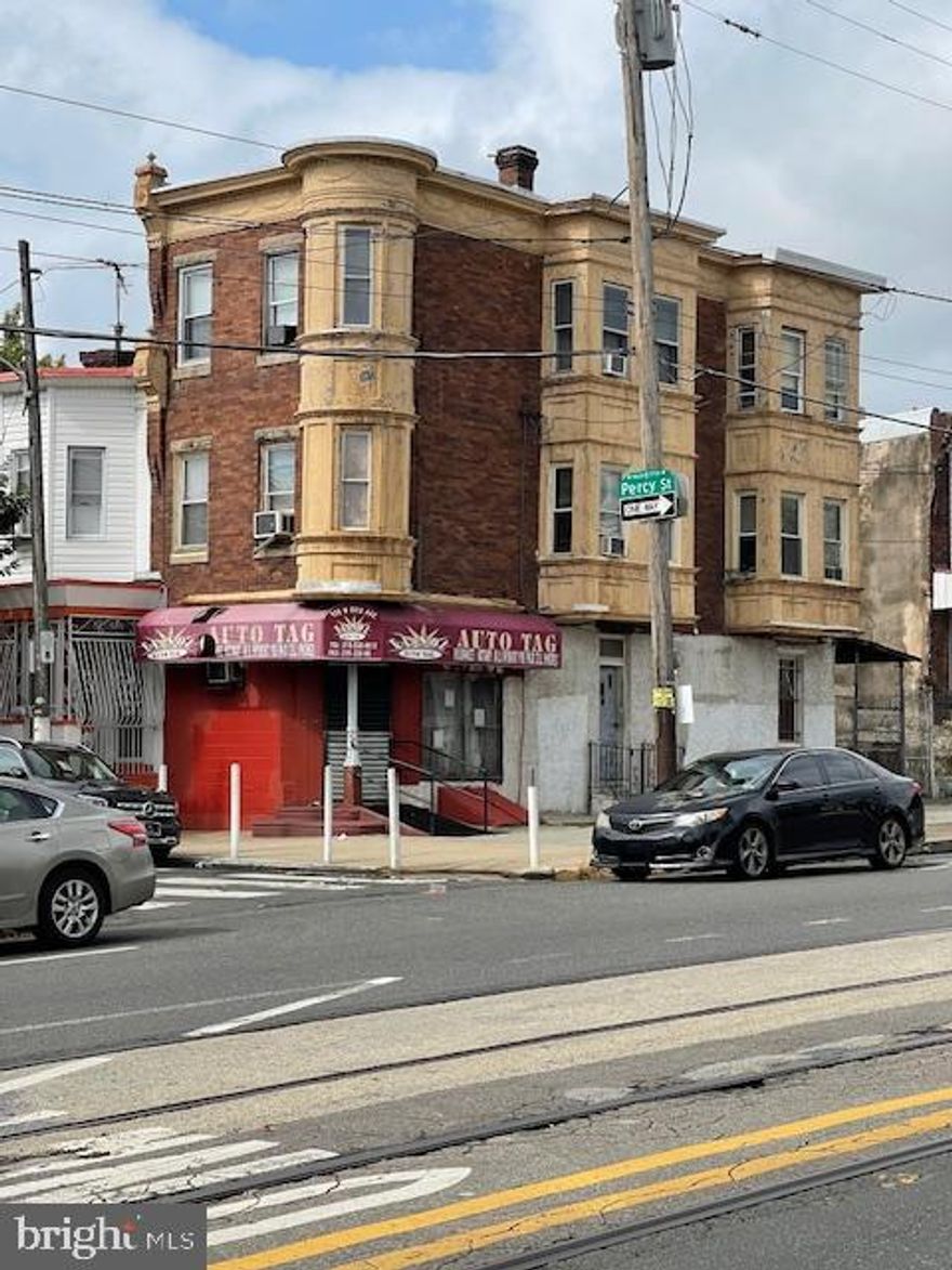 Huge corner building in the Franklinville section of Philadelphia!  This property has great potential and may be your cash cow.  Legal commercial with two dwellings!  The first floor is available for a commercial business. It used to be an auto tag.  You may turn it into a corner convenience store, tax office, multi-service store, etc.  There are two additional apartments above that are fully occupied with long term tenants that would love to stay!  The second floor has two bedrooms, one bathroom.  The third floor has three bedrooms and one bathroom.  This property is ready for the new investor or owner occupant.  You may live in one unit and collect rent from the other units to pay your mortgage or collect rent from all three units!  The potential is there.  Convenient location.  Close to public transportation, stores, health centers, supermarket, schools, etc.  Don't wait!  Start collecting passive income now!