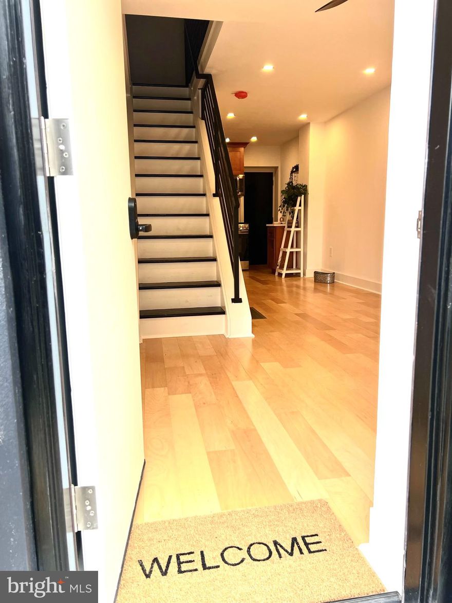 This Newly Rehabbed Home has all the Bells and Whistles a Homeowner can ask for! Everything is new in this home from the Roof to the Basement.  This modern home showcases gorgeous wide plank natural wood floors throughout the home. These floors lead into to the trend worthy Kitchen. The Shaker cabinets offer warmth and sophistication with the cabinet molding details. No expense was spared from the updated lighting, remote controlled ceiling fans and a hard wired fire alarm system.  Located off the Kitchen is One of Three Outdoor spaces this home has to Offer. You will find the spacious basement access that offers ample additional storage. You will notice a Brand New Crown Heater, Brand New Water Heater and all new Pex Plumbing throughout the home. Not only is the home safe the meticulous install of electrical and plumbing is aesthetically pleasing.  All new Vinyl Windows throughout and Modern Trim throughout. As you make your way up to the second level you will notice the black iron sleek railings. The second level offers a Bathroom that screams beauty and relaxation. This level is complete with a Bedroom and Second Level Fenced Deck. As you make your way to the Master retreat you will find an additional Private Deck and Third Story Laundry.  The Outside space is just as impressive as the indoor spaces with the horizontal  modern wood  fencing along with modern window planter boxes that offer so much Charm.  A list of additional updates this home has to Offer  will be attached under documents. Minutes from Center City and the Piazza. Located closed to dog parks and restaurants, galleries and shopping. In walking distance to the night experience the City has to Offer. Close to Public Transportation and The EL. The only thing missing in this Home is YOU!
