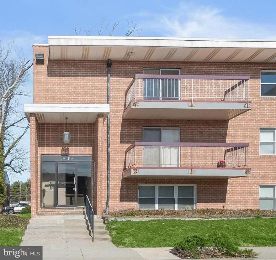 This exceptional top-floor residence is the largest unit in sought-after The Regency, offering an impressive 2,354 square feet of living space recently renovated throughout. This unique corner condo features four spacious bedrooms, 2.5 baths, and two private balconies, with expansive views from nearly every room.  A large, sun-filled living room with a private balcony showcases beautiful wide-plank LVP flooring and creates a bright, inviting space to relax or entertain. The dining room flows into the spacious modern kitchen featuring a striking mosaic tile backsplash and stainless steel appliances. The primary suite offers a wall of closets and a private en-suite bath, while two additional sizable bedrooms and a full bathroom complete this wing of the home, with abundant storage provided by multiple closets throughout.  Just off the foyer is a convenient powder room and a large laundry room with built-in shelving. A versatile fourth bedroom features a brick fireplace and opens to its own private balcony, perfect for guests or easily used as a home office, family room, or flexible living space.  Additional highlights include an oversized laundry room and includes a designated parking spot #37, closest to the front entrance.  Ideally located near major commuter routes with convenient access to shopping, dining, and entertainment options. (some photos have been virtually staged)