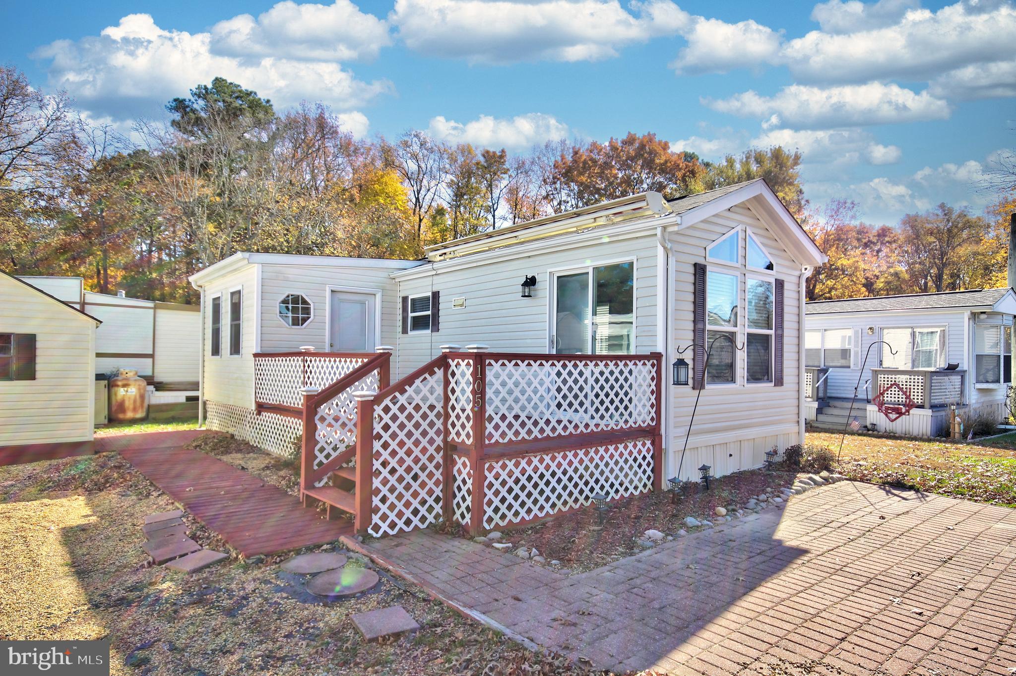Attention Investors & Entrepreneurs! Discover the perfect vacation retreat in the highly sought-after White Horse Park! This charming 1-bedroom (plus bonus room), 1-bathroom mobile home is a gem, boasting modern upgrades like new flooring, updated cabinets, a newer roof, and an updated HVAC system. Step outside to enjoy a spacious deck with a sleek remote-controlled awning, a convenient storage shed, and in-unit laundry. As part of this vibrant community, you'll have access to fantastic amenities, including a pool, playground, boat ramp, and the peace of mind provided by gated security! This community is a seasonal vacation property, allowing 9 months of use, while the park is open year-round. Don't miss this incredible opportunity! Schedule your private tour today and see why this home is a must-have for your portfolio!