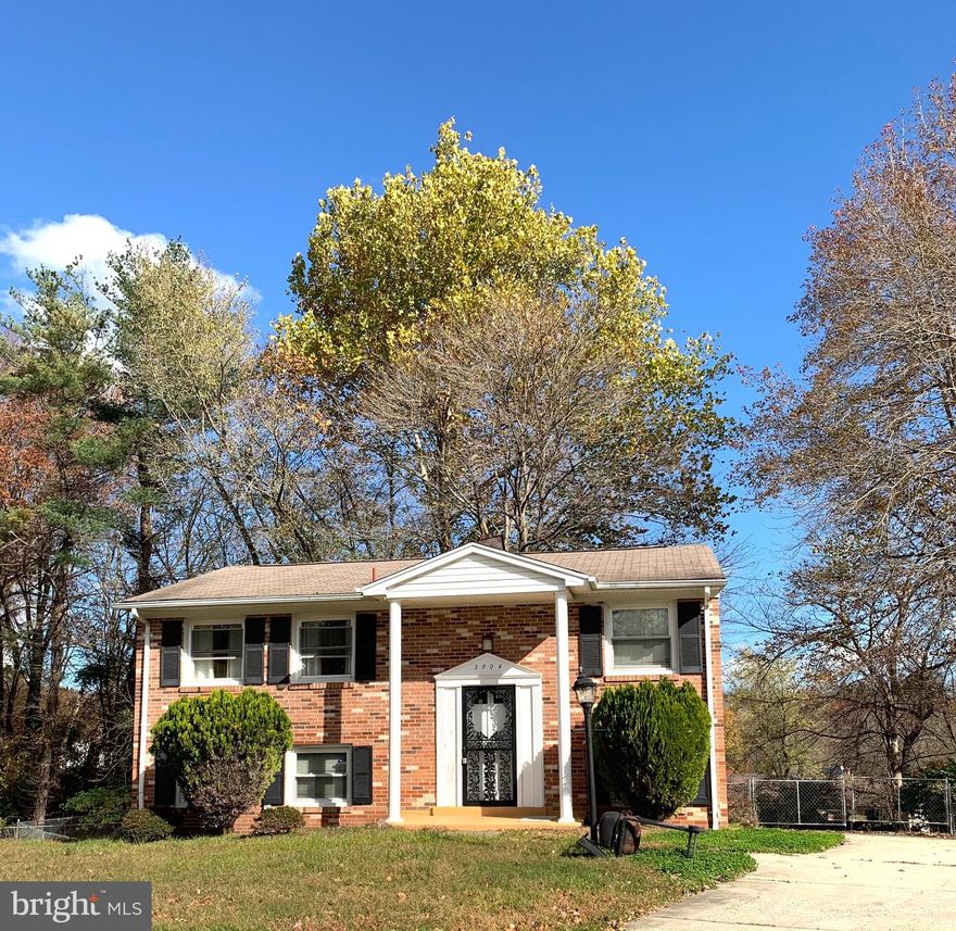 Spacious split level on a massive lot great backyard space for entertaining, sports or just relaxing.  Great price for this beautiful home.  Hardwood floors throughout.  Living room is very large & light filled.  Updated bathroom upstairs w/ gorgeous tile all the way up to the ceiling. 3 bedrooms upstairs & two full bathrooms.  Large open kitchen is open to dining room to great to interact w/ your guest.  Nice size rec room leads to the backyard.  Nice size laundry room has room for storage as well.  Step outside & it's backyard galore, concrete patio &  it's fenced in.  AS IS come & spruce it up great house for the price.  Expansive driveway can fit 6 cars and more street parking.  Great lot.  Location is great in sought after Marlboro Meaws. USDA loan area no money down.