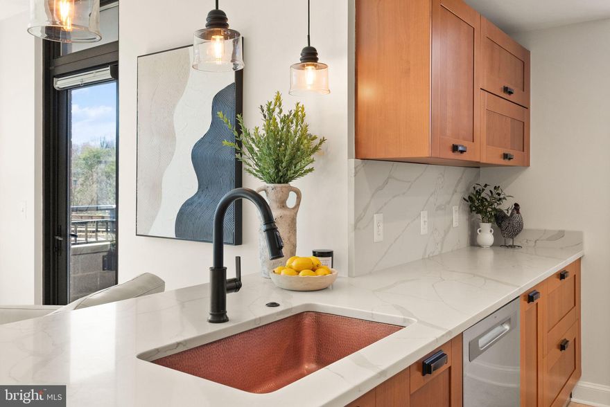 Welcome home to this STUNNING condo in the heart of Alexandria!  This Midtown property has so much to offer and is truly one-of-a-kind.  You'll be blown away by the high-end designs that catch your eye the moment you walk in the door - no expense was spared here!  In this unit, you'll enjoy an open floor plan featuring incredible engineered wood floors, a gorgeously updated kitchen with white quartz countertops and a custom copper sink, bathrooms that belong in a magazine, and beautiful light fixtures!  The lengthy UPGRADES LIST includes quartz kitchen countertops (2023), copper sink (2023), push-button garbage disposal (2023), cabinet hardware (2023), new washer and dryer (2023), engineered hardwood flooring and kitchen floor tile (2023), full hall bathroom remodel (2023), commercial grade water heater (2023), light fixtures (2023), primary bathroom remodel (2022), fresh carpet (2022), and the HVAC system (2017).  If you're looking for a true-turn key home, this is it!  This unit also conveys 2 parking spots - 1 outdoor and 1 indoor.  At the Midtown, you'll have access to endless amenities -  24/7 concierge, secure parking garage, huge outdoor pool with a spa, outdoor BBQ area with seating, clubhouse room, fitness center, cyber cafe, and a guest suite available for rent hotel-style in the building at a very reasonable rate!  The location is the icing on the cake - situated in prime Alexandria, you're right across the street from a metro station, a short drive to Old Town Alexandria, Arlington, and Washington DC!  This unit will not last long, come see it for yourself!