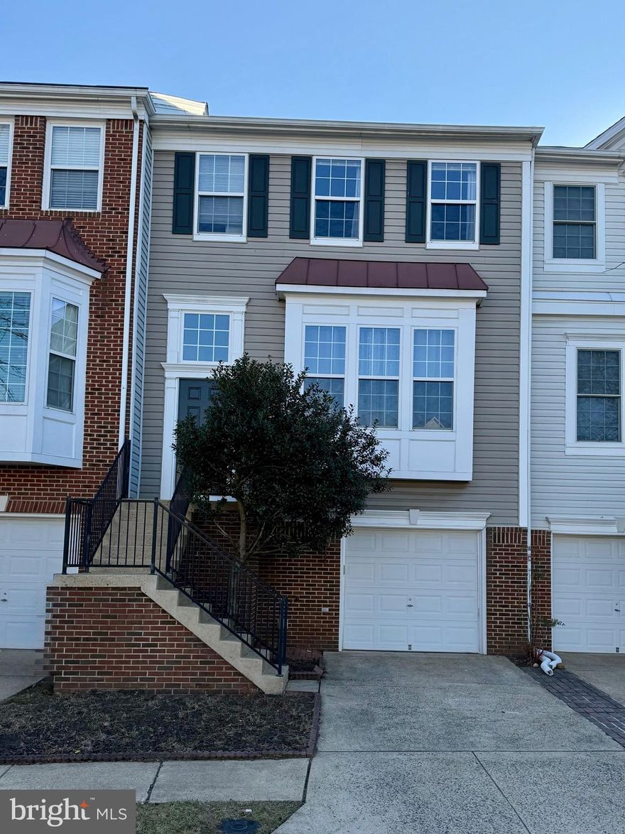 For Rent, Available 1/15/26  - this  exquisite townhouse is conveniently located in the most desirable Loudoun Parkway Center, right next to the 267 toll road exit, This beautiful townhouse is freshly painted in neutral colors, new flooring in basement and laundry room with thorough maintenance performed by the landlord, fresh and ready for new tenants. This well taken care of townhouse has generous living and entertaining spaces, featuring a fully finished walkout basement with an entrance, perfect for entertaining or relaxing. The combination of open and traditional floor plan seamlessly connects the family room to the kitchen, creating an inviting atmosphere for gatherings. The kitchen is equipped with modern appliances, range hood, a gas range, dishwasher, and refrigerator, ensuring culinary delights are just a step away. Located in a vibrant neighborhood, residents benefit from nearby parks, excellent schools, and convenient public services, enhancing the overall quality of life. Rent includes HOA fees and trash removal, Pets are on case by case basis with breed restrictions. Embrace the lifestyle this community offers, where comfort meets convenience.