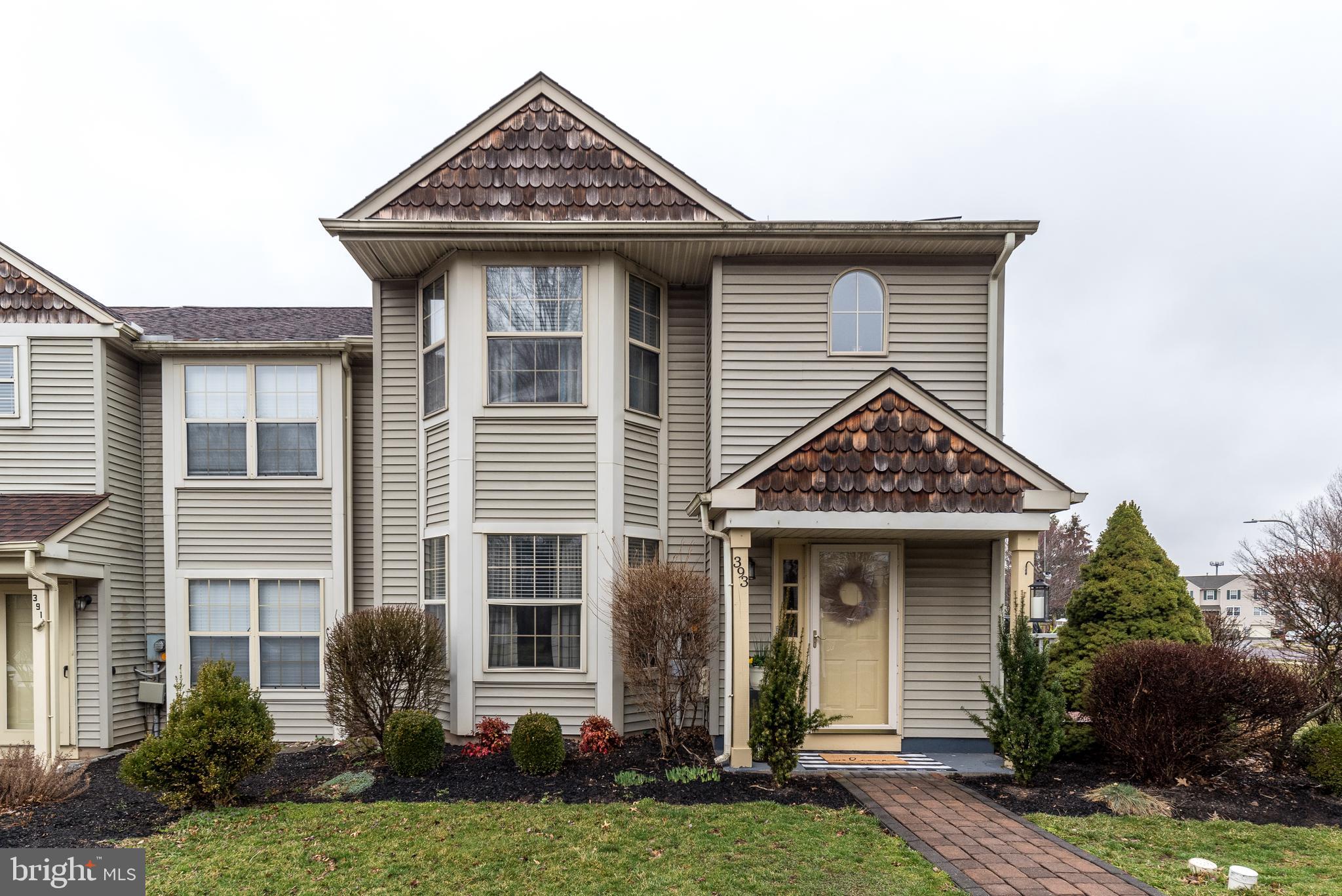 Welcome to this meticulously maintained and updated end unit townhome in the desirable community of Coventry, located in charming Perkasie Borough and just a short walk to the local parks, walking and biking trails, restaurants, and shopping with that small town feel. As you arrive you are greeted with a lovely stone walkway leading you up to the front door and offering two off street parking spaces. Step inside and you will be greeted with a bright open floor plan, newer engineered hardwood flooring throughout the first level, and a freshly painted interior with trendy farmhouse decor and color palate. You will immediately see the pride of ownership throughout with nothing to do but unpack your bags and enjoy all this fine home has to offer. The foyer area offers a coat closet and opens up to the bright and spacious dining room with large bay window that is currently set up as a dining room but could also double as a living/family room as well. Continue over to a bright office area to comfortably work from home, created in place of what could also function as a dining area. It features a sliding door leading outside to the private patio and well landscaped yard, a perfect place to sit and enjoy the morning. A well equipped kitchen with pantry features an abundance of cabinetry and counter space for all the cooks in the family and a breakfast bar which overlooks a cozy family room, a great place for entertaining family and friends. There is a large utility closet featuring the washer and dryer. Rounding out the first floor is a convenient powder room. Upstairs the main bedroom suite is a relaxing retreat featuring a large bay window to let the light spill in, a large walk-in closet, engineered flooring, and an updated ensuite bathroom with beautiful tile. Two additional spacious bedrooms all have nice sized closets and share the upgraded hall bathroom. Also upstairs is pull down stairs to an insulated attic with floor offering plenty of storage.  Additionally, the roof is 9 years old, HVAC replaced a few years ago, new hot water heater, new dryer ducts installed and all appliances are included. The beauty of this neighborhood is nice large lots with a very low association fee of $135.00 per year and no capital contribution. Make your appointment today, you will be ready to fall in love.
