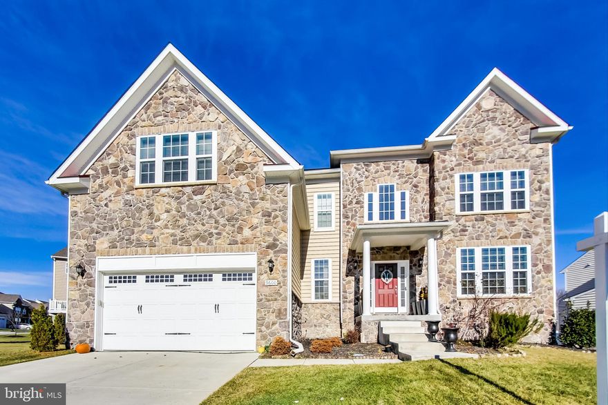 Beautiful four-bedroom three story colonial home located in vibrant neighborhood. Situated on a sizeable 10,000+  corner lot, this move-in ready home boasts an open floor plan with natural light from expansive windows, elegantly designed materials, and high-end finishes throughout.  First floor includes satin finish hardwood floors and offers adjoined den and dining room, family room with fireplace, and sunroom attached to bright kitchen featuring marble countertops and stainless-steel appliances. Second floor offers three bedrooms plus a master.  The three bedrooms has generously sized closets and a shared full bath.  The luxurious master bedroom features an en-suite bathroom, large sitting area, and walk-in closet with custom built-ins. Basement includes a bonus room that can transform into a game room or home office, as well as spacious unfinished room fit for a home gym, studio, theater room or storage. Additional features include a built-in speaker system on first floor that carries out to the deck and outdoor space. Home sits steps away from a serene walking trail, perfect for nature lovers alike.  Beyond the lush landscape of this well-designed home, homeowners can enjoy additional amenities in a newly built community center featuring a clubhouse with a state-of-the-art fitness center, screening room, entertainment space, two outdoor pools and park.