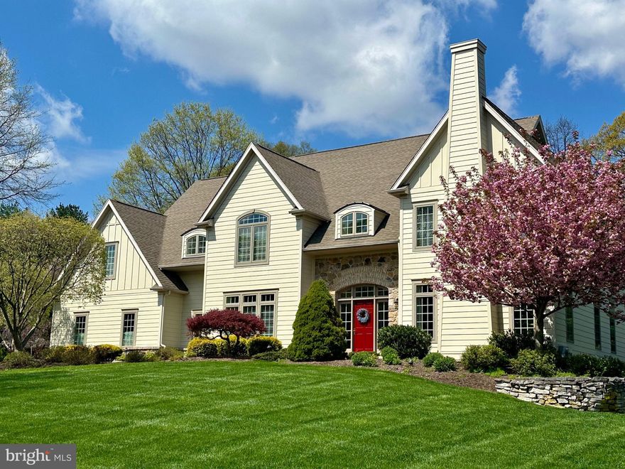 Nestled in the bucolic township of Buckingham, PA, this remarkable property embodies the epitome of stylish living. Crafted by the esteemed builder Richard Zaveta, this home is a testament to fine craftsmanship and attention to detail. There’s room for everyone with over 4900 sq ft spread across the main and upper floors, plus nearly 1200 sq ft of finished lower-level space, the residence exudes spaciousness and elegance at every turn. The property is part of the exclusive Armitage enclave, comprising just six custom homes, ensuring privacy and exclusivity in a park-like setting. Inside, designer  amenities abound, including silk draperies, two fireplaces, custom millwork, interior stone walls and plenty of built-in storage and closets. The professionally landscaped grounds, complete with a new rear brick patio and a large pavilion with a new cedar shake roof, provide a serene backdrop for relaxation and entertainment. Indoors, the finished lower level offers a custom Charles Weiler built bar, powder room, and home theater, while the mirrored gym area caters to fitness enthusiasts. The sun-filled office provides an inspiring workspace, while the four-season sunroom with a radiant heated floor offers year-round comfort and enjoyment. Recent updates, such as new carpets, garage doors with Wi-Fi openers, newer air conditioning systems, and fresh paint throughout, ensure modern convenience and practicality. With five large bedrooms, four full bathrooms, and two half bathrooms, as well as a walk-in main bedroom closet with organizer and an updated main bathroom with imported tile, illuminated mirrors and marble countertops, every detail of comfort and style is thoughtfully addressed. The stucco siding has been removed and replaced with James Hardie fiber cement siding, with all work done by a Hardie preferred contractor (transferrable warranty). The auto enthusiast will appreciate the epoxy coated garage floor, ensuring easy clean-ups and lasting beauty. Boasting a prime location within the award winning Central Bucks School District, renowned for its academic excellence, and situated in one of the safest towns in America (according to Safewise 2021), it offers both security and educational opportunities of the highest caliber. There's easy access to NYC via NJ Transit. Close to Princeton, New Hope and downtown Doylestown, this property presents a rare opportunity to experience an unparalleled standard of living in one of Pennsylvania's most desirable communities.