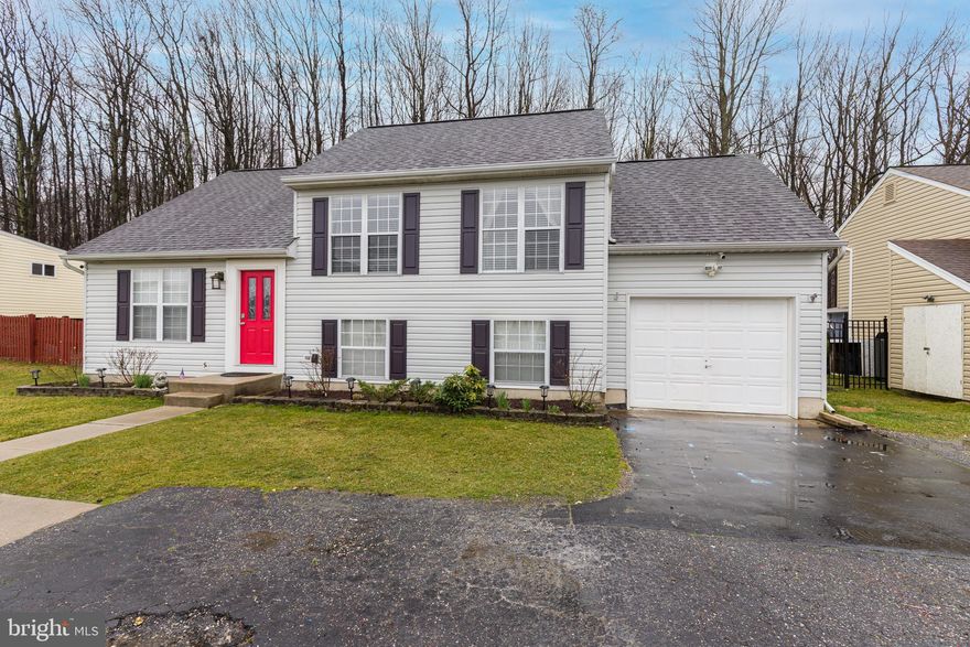 Multiple Offers in.  Please Submit Highest and Best by Thursday the 25th at Noon.  Must See Updated Home in Bay County with a Garage and Large Fenced in Backyard.  Features Hardwood Floors, Updated Kitchen w Granite, 2 Full Bathrooms and a Large Composite Deck.  Above the Attached Garage is a Bonus/Secret room that could be used as another Bedroom.  Located off the Main Road and Backs to Trees/State Park.  House is in great shape and is sold As-is.