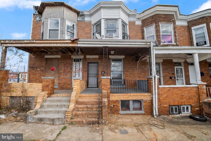 Freshly painted 4BR/2BA brick Townhome located in the Western neighborhood.  Step up to the covered front porch and open the door into your classic style Baltimore Townhome.  The main floor features a spacious living room, a full bath, an open concept dining room and kitchen, and laundry.  On the second floor are three sizable secondary bedrooms, a large primary bedroom with a bowed window, and a full bath.  The lower level is unfinished offering utilities and storage.  From the main floor step outside to a privacy fenced yard with a spacious patio ideal for entertaining.  This home needs some TLC with so much to offer new homeowners including being in close proximity to shopping, restaurants, and commuter routes.