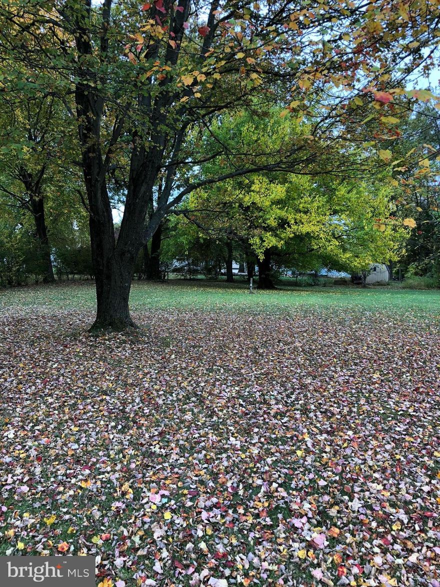 Beautiful flat cleared lot in Carroll Valley.  Approximate size is 0.46 of an acre.  This lot has public sewer available with a sewer hookup fee. Lot is to the left of home at 15 Crossland Trail.  4 corners are marked.  No well on property.  Buyer to Call courthouse for estimated taxes. Lot has a new subdivision plan separating it from the home and will be recorded before settlement.