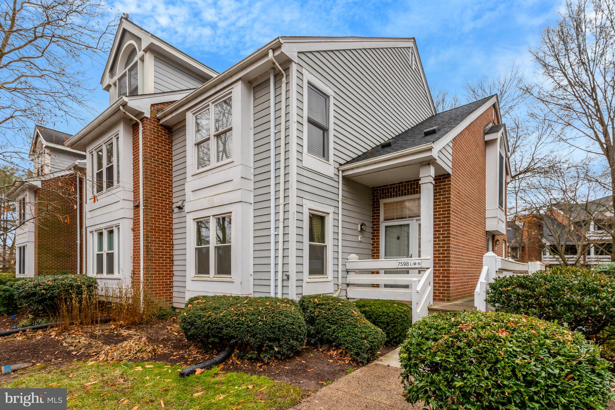 Welcome to The Cove, a quiet & charming lakeside community nestled just off Rt 50 in the heart of Falls Church with easy access to DC. This beautifully renovated, light-filled fully furnished one-bedroom home boasts an open-concept layout with spacious living areas and abundant natural light. The living room features soaring vaulted ceilings, a new, built in pull down "Murphy Bed" perfect for visiting guests, a cozy wood-burning fireplace, and large windows that create a warm, inviting atmosphere. Adjacent to the living room, you'll find a brand new kitchen with quartz counter tops and backsplash. Just off the kitchen is a delightful newly tiled dining area with a sliding glass door leading to a private balcony, offering serene views of mature trees and lush nature. The generously-sized master bedroom also features vaulted ceilings and a walk in closet with custom organizers, and an additional second closet providing ample storage space. A newly renovated luxury bathroom with marble floor and high end fixtures completes the package. This home includes in unit washer/dryer, one owner’s parking pass and two guest parking passes for your convenience. The Cove community offers an array of amenities, including a swimming pool, dock, walking paths, and picturesque lake views. Enjoy easy access to the vibrant Mosaic District, with its shopping, dining, and entertainment options, Tysons Mall, as well as the nearby Providence Recreation Center. With close proximity to Downtown DC, I-495, Rt 66, Dulles Airport, and the Dunn Loring Metro, you'll experience unparalleled convenience and accessibility. Can be rented furnished for a higher rental amount *** Available November 1st - NO PETS -***