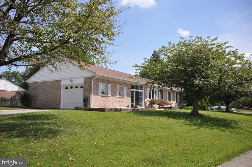 Solid all brick rancher in sought after Greenridge 2.  Spacious home with over 3,000 finished sq. ft.  Plus breezeway that leads to oversized garage.  Garage can have another access door installed or use as space for storage, garage band, hobby space, workshop, etc.  Partially fenced yard has perfect "she" shed or play shed.  Another shed is included on the side yard.  Level yard is .43 acre on a corner lot.  Finished basement has 2nd full kitchen , family room, full bath and 2 more additional bedrooms.  Perfect in-law apartment has steps to enter from the breezeway for privacy.  Attic is partially floored with walk up steps for more storage.  Roof 2010, Heating and A/C 2015, Hot water heater 2016. Basement waterproofed with lifetime warranty. Original owner is sad to leave this beautiful home.   Great location for easy commute to 95.  Close to shopping, schools, restaurants, etc.