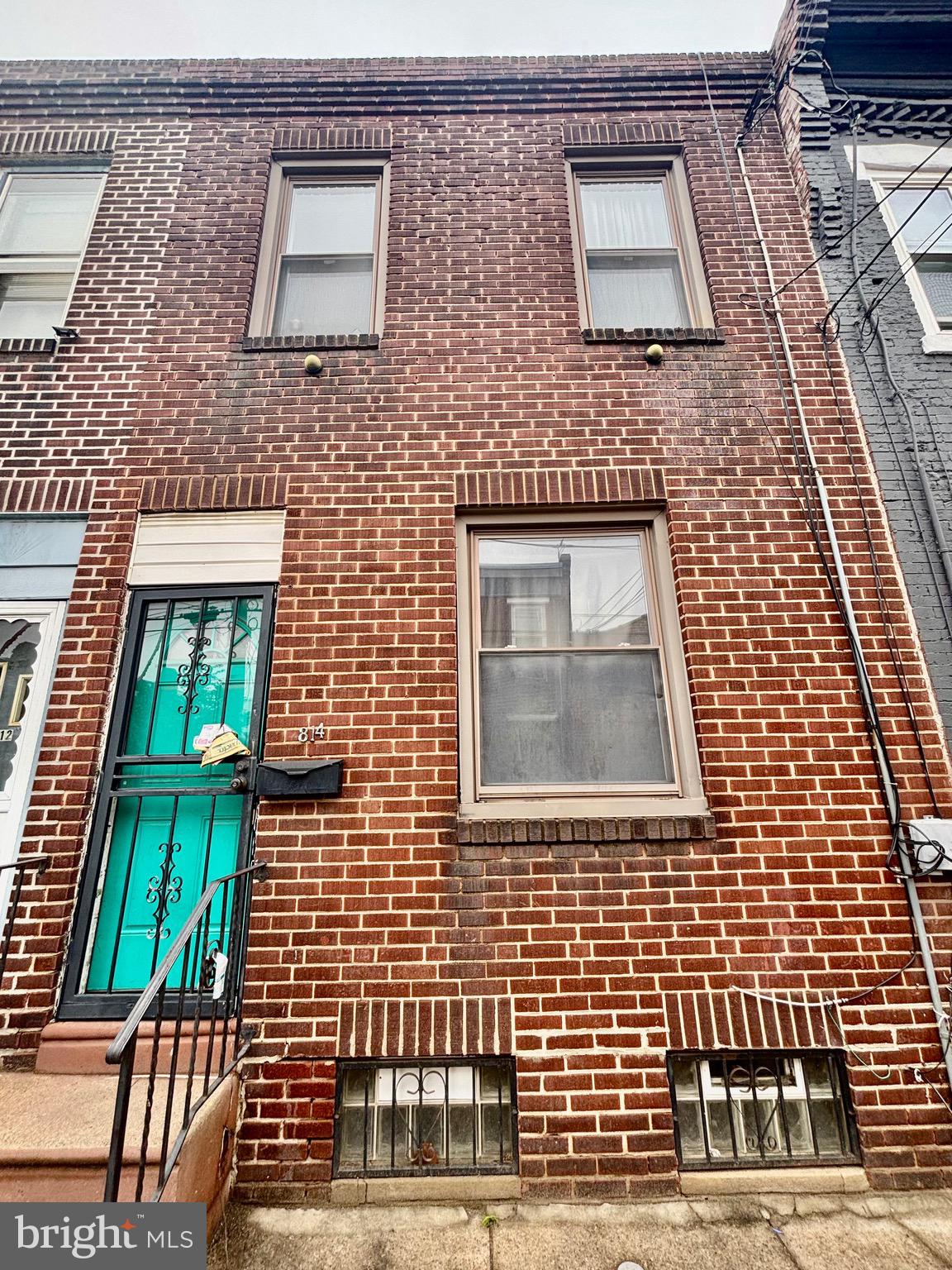 2 Bedroom investor special on a small side street in Kensington just two blocks north of Lehigh Avenue. Situated on a decent size lot (14x85) this house has an open floor plan, recessed lights throughout + exposed brick. Kitchen has washer/dryer for convenience and a large mud room off the rear. 2nd floor has two go0d sized bedrooms and a very large full bathroom on the rear. Full basement w/ newer hot water heater and gas heater. House needs cosmetic updates and a good cleaning to get back to where it was when previously rented at $1,300+ Low real taxes + located in the path of development. Not a shell at all, but will need to be updated.