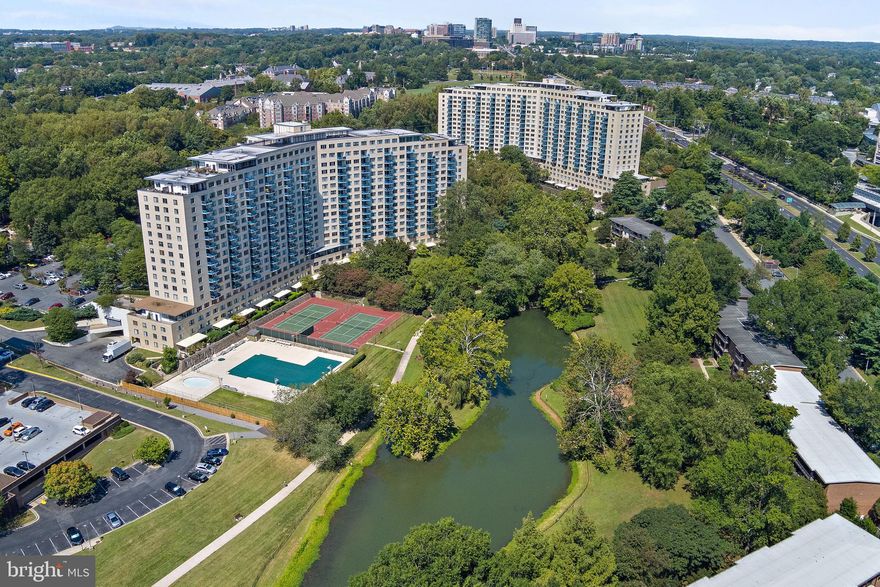 BEST VALUE in North Bethesda! Shows beautifully, totally livable as is, does need some updating and priced accordingly. Sold AS IS. Grosvenor Park III is an elegant high amenity building offering only 5 penthouse apartment homes, each of which is an extraordinary residence and rarely offered for sale.  Large and lovely this penthouse apartment home is ideal for those seeking the peace of mind and security of apartment living but still want the option of grand scale entertaining. Floorplan is ideal for easy entertaining, inside and out. Host holiday dinners for family and friends. Easily accommodate guests at parties. Spread out with plenty of communal space of seek solitude in the many private spaces, both options are yours, here. This light filled penthouse apartment home boasts 3 bedrooms (all with ensuite baths) 3 full and 2 half baths, formal living room with 10 foot ceilings and decorative fireplace, formal dining room, gourmet eat in kitchen with pantry (gas cooktop), lovely foyer to greet guests, gallery, library, IN UNIT LAUNDRY ROOM, and extraordinary outdoor living space. The king sized primary suite features two massive walk in closets, a sitting area, and ensuite with two large vanities and custom shower enclosure.  Custom built-ins throughout. Lovely finishes, millwork and furniture quality cabinetry. Live happily ever after as it is, add a few personal touches, or bring your architect and create the finest residence in the area, with the size and scale of this home, your options are endless. Extremely rare and featured here is an outdoor living space like no other. This penthouse features a massive terrace with screened enclosure overlooking Bethesda and Washington DC. Adorned with planters featuring mature specimen plantings and space galore. Panoramic views abound, it is absolutely stunning and provides a lifestyle like no other. Life on the 17th floor is quiet, serene and exclusive. Two premium deeded garage parking spaces included. Grosvenor Park III offers a wealth of amenities including 24/7 security, professional on site management, outdoor pool, tennis, fitness center, lake, scenic walking paths, on site dry cleaning, award winning on site market, and more. Excellent location, just a quick walk to Grosvenor Metro, minutes to 355/495/270, downtown Bethesda, Washington, Blue Ribbon schools, shopping, dining, entertainment and everywhere you want to be. Truly a once in a lifetime offering. No pets. No smoking.