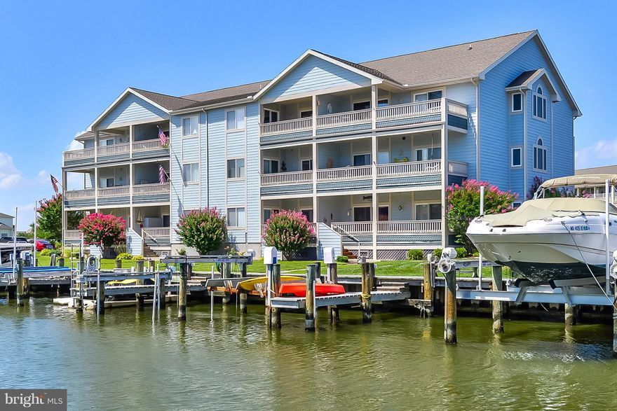 This beautiful condo is 3BR/2BA in the Baywatch III Building overlooks the water in the fabulous community of Heron Harbour Isle and comes with boat slip #82 with 8,000 lb lift.  This unit is being sold furnished, has a lovely beach decor and is turnkey.  It was never rented and is in pristine condition.  There is a large dining area off the kitchen with breakfast bar.  The kitchen has upgraded appliances and granite countertops sure to delight the chef in your family.  The living area has a gas fireplace for year around enjoyment, great family time and entertaining with friends.  You will love the master bedroom overlooking the water with the nice master bath, and your family and friends will enjoy the other two bedrooms. There are upgrades throughout including a new HVAC, hardwood and tile floors. There is also a large deck off the living area that overlooks the canal with magnificent sunset views.  There are new glass sliders going in and decking board. Unit has been freshly painted May 2019. The boat slip has an 8,000 lb lift and there is a kayak launch with easy access to the water.  Imagine yourself in this beautiful condo in one of the nicest communities in Ocean City. Heron Harbour Isle is amenity rich with two outdoor pools, an indoor pool, a kiddie pool, fitness center, social room, sauna, locker room, two Har-Tru tennis courts, sidewalks and piers. Enjoy your boat, fishing, crabbing, kayaking and paddle boarding all directly out your back door, and make memories that will last a lifetime.  New HVAC 2017, & newer appliances.