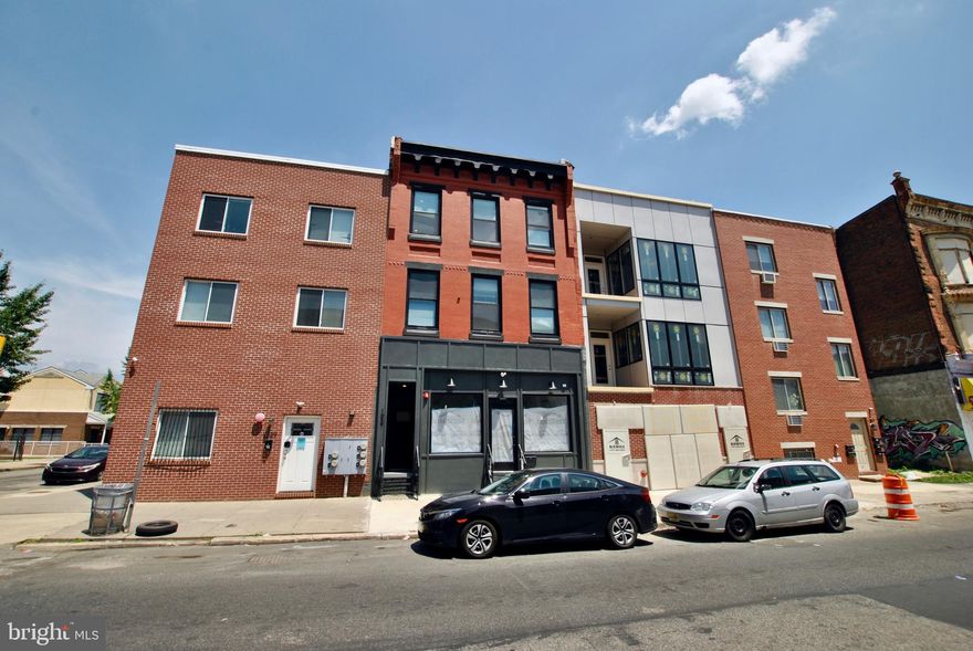 Photos were taken prior to installation of appliances and tenants moving in - all units are occupied and fully renovated.

Welcome to 1937 Cecil B. Moore Ave, a fully renovated mixed-use property offering a strong investment opportunity in one of Philadelphia’s rapidly growing corridors. Renovated in 2021, the building features three residential units above a ground-floor commercial space, creating a balanced mix of residential stability and commercial income.

The property includes three residential apartments totaling 7 bedrooms, providing spacious layouts well suited for today’s renters. The residential units offer modern finishes and comfortable living spaces that help attract and retain tenants in this high-demand rental market.

With five years remaining on the tax abatement, the property continues to benefit from reduced operating expenses while maintaining strong performance. With unabated taxes, the asset is currently producing an NOI of $60,536, operating at a 6.92% cap rate and supporting a 1.27 DSCR, making it an attractive option for investors seeking stable income and favorable financing metrics.

With a full renovation completed in 2021, updated systems, and a well-performing mixed-use configuration, 1937 Cecil B. Moore Ave presents a compelling opportunity to acquire a stabilized, cash-flowing asset with long-term upside in a growing Philadelphia neighborhood.