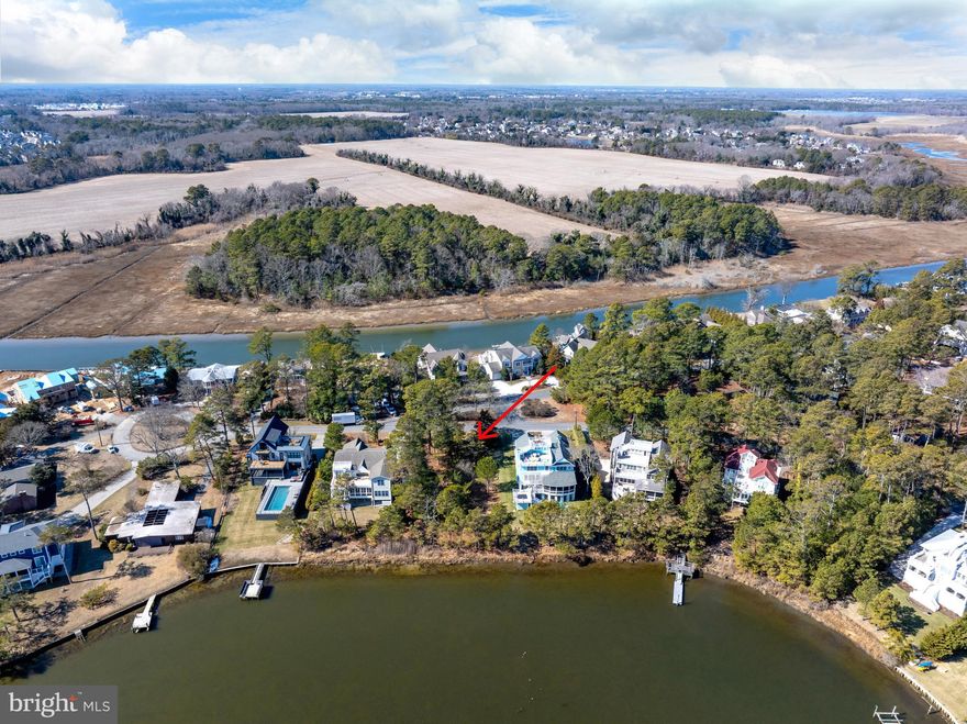An extremely rare offering. A once in a lifetime opportunity. A prime building lot located on the North Shores marina/lagoon with direct navigable access to the Lewes-Rehoboth Canal. The lot offers an east-west configuration with a panoramic waterfront view amenity to the east. The exclusive and restricted North Shores community offers a private beach, beach service, outdoor pool with pool house, tennis courts, community marina and private security. Situated just south of the Cape Henlopen State Park, the location offers easy access to in-town Rehoboth Beach for resort area attractions including the boardwalk and Rehoboth Avenue.