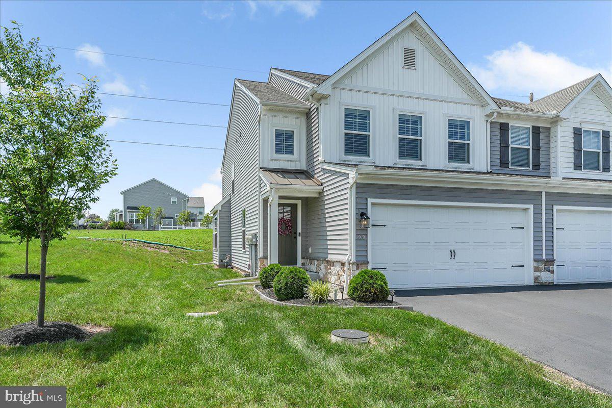 Exquisite 3 bed/2.5 bath end unit with open floorplan and upgrades galore on quiet cul-de-sac in sought after community of Rolling Meadows.
Better than new townhome showcasing ALL the high end finishes and updates you could ask for.
Built in 2021 by Berks Homes, the Lilac floorplan offers Eat-in kitchen(10x16), center island with Quartz countertops, deep sink, matching tile backsplash, soft close drawers, 48" cabinets, recessed lighting, crown molding throughout, high end breakfast lighting fixtures w/blacksmith finish and large pantry.
Spacious Dining room(10x14) with crown molding, luxury vinyl plank, and walkout access to rear deck(10x10).
Large, cozy and bright Living room(15x14) with luxury vinyl plank floors, extra windows, recessed lighting and views looking out to rear and side yards.
Attached 2-car garage with 4 layer epoxy flooring and custom painted walls.
Garage interior door access takes you past large pantry and storage cubby and into Kitchen.
All matching high efficiency GE Kitchen appliances and washer/dryer included!
Upstairs the spacious Owner's suite(14x14) offers upgraded carpet, walk-in closet, ceiling fan and owner's bath with stall shower, high end finishes including luxury vinyl flooring and 48" double bowl vanity .
2 more spacious bedrooms (11x17) and (12x11) featuring upgraded carpets, large closets and storage combine with full hallway bathroom and upstairs laundry to complete the 2nd floor. Entire 1st and 2nd floors professionally painted and custom blinds professionally installed in each window .
The unfinished basement(25x37) awaits your finishing touches. Plumbed and ready for your full bath upgrade with the high ceilings, and egress window that will enable you to increase your finished interior space or keep as dry storage.
Located in award winning Boyertown school district, Rolling Meadows is close to major shopping, parks, golf courses, sports fields, and restaurants plus built by reputable and highly successful Berks Homes. 4 years young w/custom finishes galore and no thru-traffic cul-de-sac plus all exterior and common area maintenance included in the low HOA, this is townhome living at it's finest!
Remainder of 10 year builder warranty included.