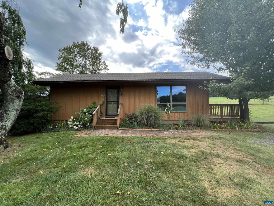 Don't miss this open floor plan modern style home with majestic views of the rolling hills and pastures of the farm nearby. One level living, spacious feeling, vaulted ceilings, large windows, wood floors, modern kitchen with stainless steel appliances. Outside you will enjoy the rear deck and plenty of parking, located only minutes to vineyards, and Between Gordonsville and Ruckersville, with easy access of Rt. 33/Spotswood Trail and in Orange County, VA. There is a $25.00 per month fee for water and sewage disposal. Tenant maintains grass and provides own trash service at their expense. Small Dogs (under 40 lbs.) are allowed with a$300.00 Pet Deposit + a $25 per month fee.