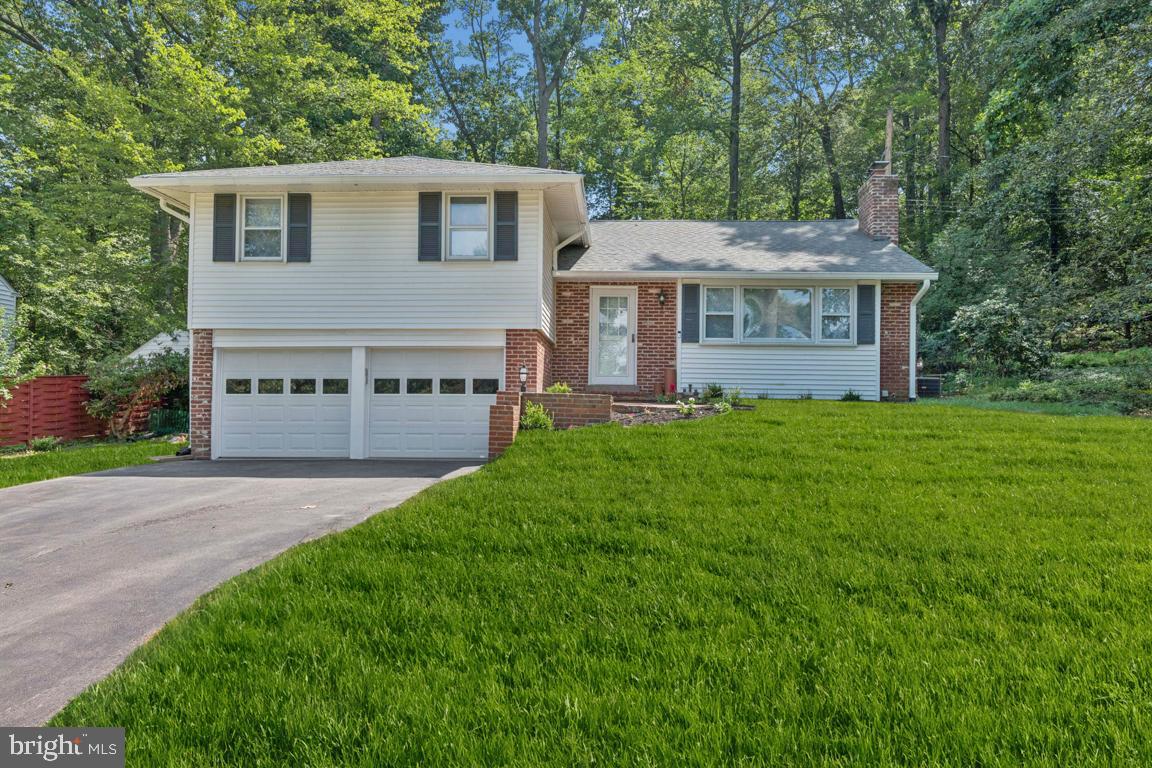 Now on the Market!! Beautifully updated 3BR, 2.5BA home in highly desirable Wayne, PA! Bright and spacious with refinished light-tone hardwood floors, fresh paint, and new light fixtures throughout. The main living area offers a wood-burning fireplace - for year-round comfort. The updated kitchen features brand-new appliances and opens to the dining room with doors leading to an oversized patio, perfect for entertaining. Step down into the large family room has a second fireplace and new flooring, a convenient powder room, and secondary access to the backyard. The upper level includes 3 well-sized bedrooms and 2 full baths, offering ample closet and storage space throughout. Bedroom closets have been upgraded with six-panel doors. Major improvements include a new roof (2022), brand-new HVAC system (2024), new washer/dryer, and a refreshed basement with newer French drain (2024), sump pump with battery backup, and freshly painted walls and floors. The exterior features a new stone retaining wall and a private patio. Prime location close to town, highways, and award-winning schools. Move-in ready with modern updates and timeless charm—this Wayne home has it all plus TE Schools.