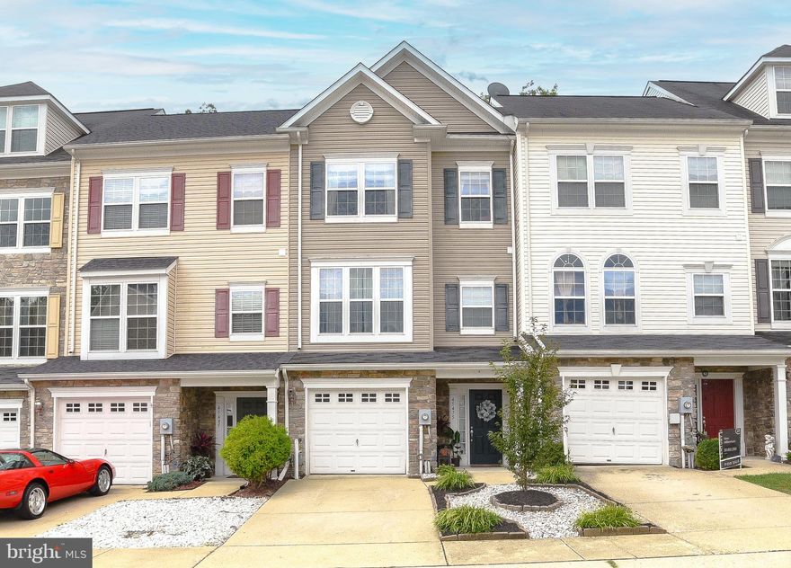 Searching for a home with all the extra's?! Check, Check, Check it out! Welcoming wide foyer greets you on the ground level along with the garage access and a newly improved half bath.  The lower level family room is spacious and includes a DIY bar that you'll love! The backyard is equipped with an entertainment space to impress! The main level features a kitchen boasting granite counter tops, a smart fridge where you can access apps, plenty of cabinets, a pantry, and an island for even more storage. The dining space showcases sliding glass doors to the deck which backs to the woods. The spacious living room showcases the vaulted ceilings and there is a convenient half bath on this level as well. Upstairs you'll find the owner's suite with walk-in closet, cathedral ceiling, bathroom with a separate jacuzzi tub for you to relax and a completely separate shower.  Two additional bedrooms with a full bath and linen closet complete the final level of this home. Don't wait too long to call this gem yours for the keeps.