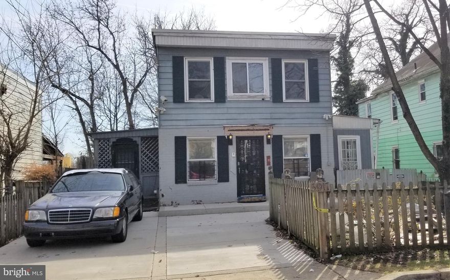 Investors and those with a creative eye, MAKE IT YOUR OWN!  This one needs a total renovation.  Solid bones open floor plan and great space.  3 open levels with 1 full updated bath on upper level and 1/2 bath on main level.  Full basement for entertaining and game nights.. Large back yard with a separate guest/party house.  Plenty of storage and off street parking.