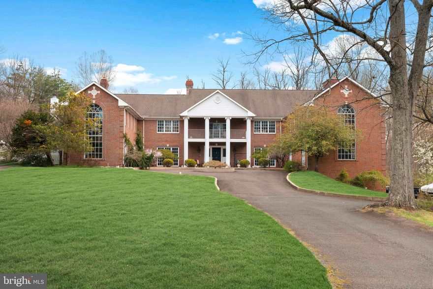 Welcome to this extraordinary estate, gracefully situated on over 3 acres in the prestigious Deer Run Farms community within the highly acclaimed Council Rock School District. From the moment you arrive at the long, private driveway, the sweeping grounds and timeless curb appeal set the tone for a residence that is both elegant and inviting. A bluestone covered front porch offers a stately welcome to this remarkable home, where rich history meets modern luxury.

This expansive property boasts six bedrooms, six full bathrooms, and five powder rooms, seamlessly blending character, comfort, and style. A special highlight of the estate is the beautifully preserved circa 1771 residence that connects directly to the main home. Overflowing with charm, the historic wing features a living room with a wood burning fireplace, a kitchen, and a powder room on the first floor; two bedrooms and a full bathroom on the second floor; and a third-floor loft primary bedroom with skylights.. The character and craftsmanship of this space add a truly unique dimension to the estate.

The main residence offers grandeur at every turn, beginning with a spacious living room anchored by a wood-burning fireplace and a parlor currently enjoyed as a billiards room. The kitchen is designed for both cooking and entertaining on a grand scale, with tile floors, two large islands, a Viking stove and dishwasher, two kitchen sinks, an additional prep sink, and French doors that open to the yard. Upstairs, three additional bedrooms each offer their own en suite bathroom, while a conveniently located laundry room completes the second floor. The primary suite is an expansive retreat, filled with natural light from walls of windows and featuring its own wood burning fireplace, a large sitting room overlooking the property, and a spa like bathroom with a Jacuzzi tub, two separate water closets, dual vanities, a stall shower, and two expansive walk-in closets.

The lower level offers endless possibilities, with a large finished basement anchored by a striking River rock wood burning fireplace, ideal for creating a custom recreational suite. A four-car garage with 9-foot doors provides ample parking and storage.

Outdoors, the property continues to impress with a heated pool and separate spa, complemented by a beautifully designed pool house complete with a living room, kitchen, and full bathroom, perfect for entertaining or guest accommodations. The expansive grounds provide both privacy and space to create the ultimate outdoor sanctuary.

Blending historic charm with modern luxury, this residence offers everything you could possibly need, while still providing the opportunity to add your own personal touches. Truly a once-in-a-lifetime offering, this estate is a rare gem in one of Bucks County’s most desirable locations.