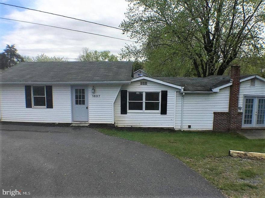 Commercial property on Middleway Pike - great visibility, 0.36 acre lot.  Formerly was a small used car lot.  house needs repairs.  Square footage is an estimate.