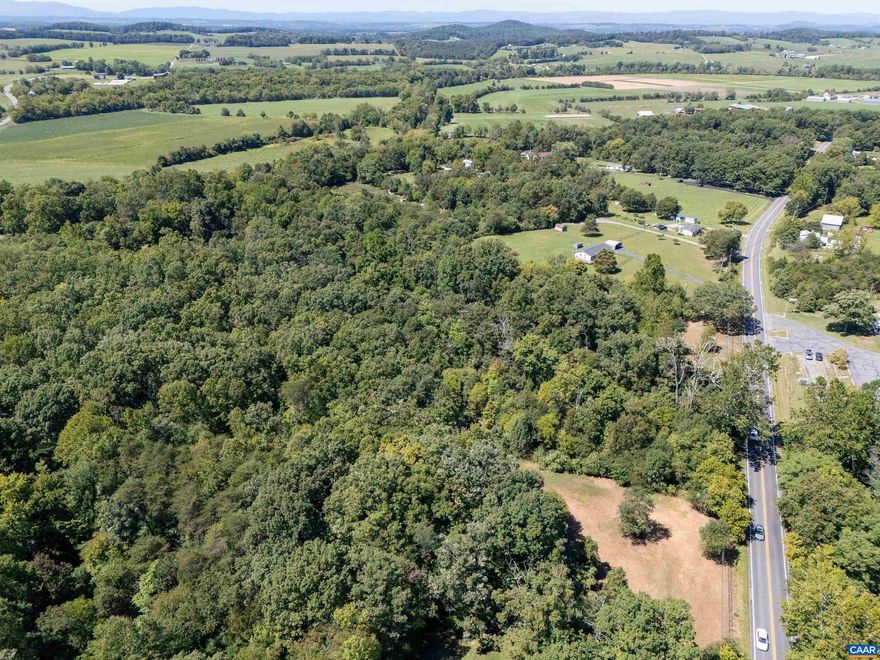 Just under 8 acres of partially cleared land in a growing area of Augusta County. This property provides an open canvas for possibilities of residential, commercial, and industrial development.  The property offers the possibility of multiple access points off of East Side Hwy. There is already a current residential entrance, former commercial entrance and a possible new commercial entrance locations.  The majority of the property which is wooded, is currently zoned agriculture. A small partially cleared portion of the property is currently zoned for General Business.   Other features of the property include an access point to the South River along with a well and septic already installed! The well and septic will be sold in as-is condition.  Call List Agent to set up an appointment and for more information!,49-62A N CRIMORA W RT 340 KNOWN AS TR 2 ON PL 7.790 ACRES
