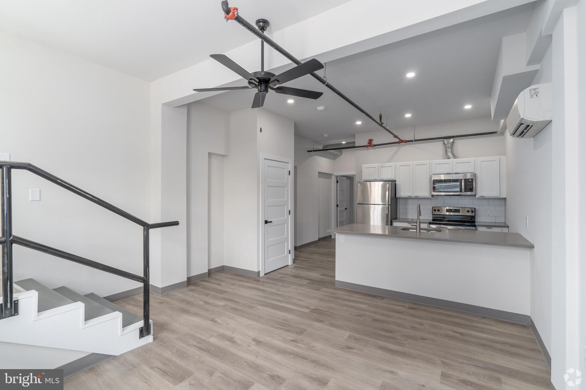 This new property is in the center of town, but two blocks removed from the busyness of Bridge Street. Onsite parking is available and these units are basically brand new. This former commercial building underwent a full conversion to apartments in 2022-2023 and was transformed into Phoenixville's newest boutique apartment building.
Unique setup in that every unit has its own exterior access either at grade level or from the catwalk. There are no shared hallways to walk through. The upper level units have dramatic high ceilings with loft storage space available as well.
All units have brand new and modern finishes, 4 piece kitchen appliance package, Quartz countertops, air conditioning, washer/dryers in the unit, Smart features, fire alarm, sprinkler systems and high ceilings. There is parking available for an additional monthly fee of $55. Don't pay for amenities elsewhere that you can't or won't use and come make this your new home in Phoenixville! (Photos are representative of all unit finishes but may not be the exact unit available).