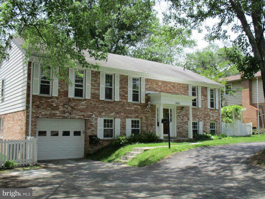 NO SHOWINGS UNTIL TUESDAY PLS - REFINISHING WOOD FLOORS. SPACIOUS, BRIGHT UPDATED HOME w/2-STORY FOYER. BRIGHT OPEN LIVING ROOM; LG. UPDATED KITCHEN, NEW APPLIANCES; BRAND NEW BATHROOM, FORMAL DINING ROOM w/FRENCH DOORS OPENING TO LG DECK w/ OUTDOOR HOT TUB, FENCED, PRIV. YARD. HDWD FLRS ON UPR LVL. TILE ON LWR LVL&  FAM. RM. WITH BRICK WALL FP,  HOME OFFICE, GARAGE. STORAGE SHED. GREAT SCHOOLS!