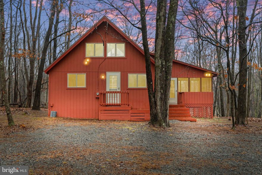 This very well maintained Elmwood/Chalet home will not be on the market long! Beautiful 0.69 acre wooded lot close to the Indoor Sports Center, outdoor pool and tennis courts. The home was completely renovated in 2020! 3 new Larson storm doors & new front door, all new windows(except fixed glass window wall), new facia/trim on exterior, painted the exterior, new flooring/carpet, new roof, new kitchen cabinets/counter tops, new shower/toilet/vanity cabinet & sink with mirror, new water heater and repaired/replaced foundation piers with concrete footings. Relax with family and friends on the huge 12x15 screened in porch and attached 36x8 open deck. Class B Family membership available with a $3, 150.00 initiation fee additional.