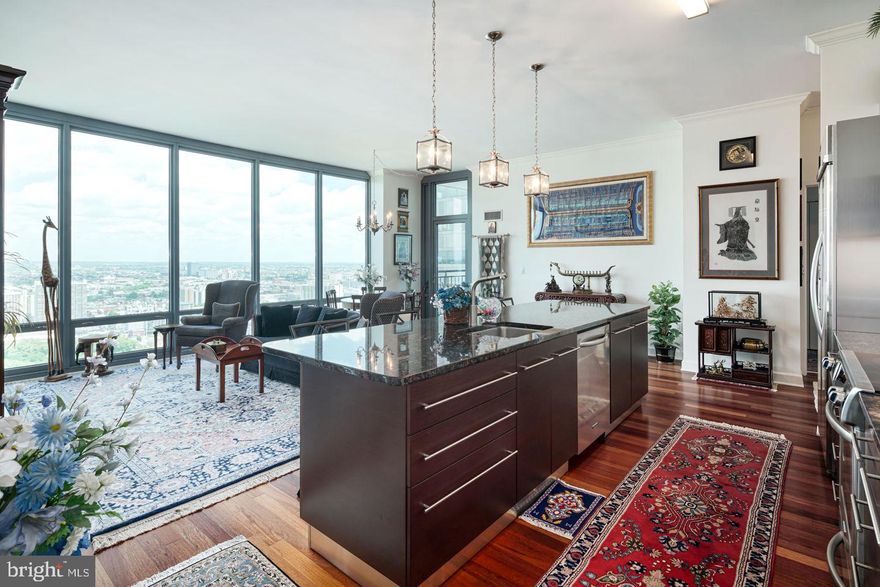 CONDO INCLUDES 2 PARKING SPOTS! A spacious and luxurious 1455 sq.ft. Penthouse condominium with unobstructed, spectacular Northern City views including Philly landmarks like the Art Museum, Schuylkill River, Boathouse Row and the Franklin Institute all from the 41th floor! This 2bed/2.5bath residence is modern and luxurious boasting granite countertops, wood floors, stainless steel appliances, 10.5-foot ceilings, and floor to ceiling windows and private balconies!! Upgrades include custom closets throughout. Master bedroom has an ensuite bathroom with double sinks, separate bathtub and shower. A private balcony offering extended views of the city. Live like a VIP at The Murano with all it's amenities! 24/7 concierge services, heated indoor lap pool, state-of-the-art fitness center, sun terrace, community room and much more. The price includes two reserved parking spaces in the attached covered garage, and a separate large storage locker